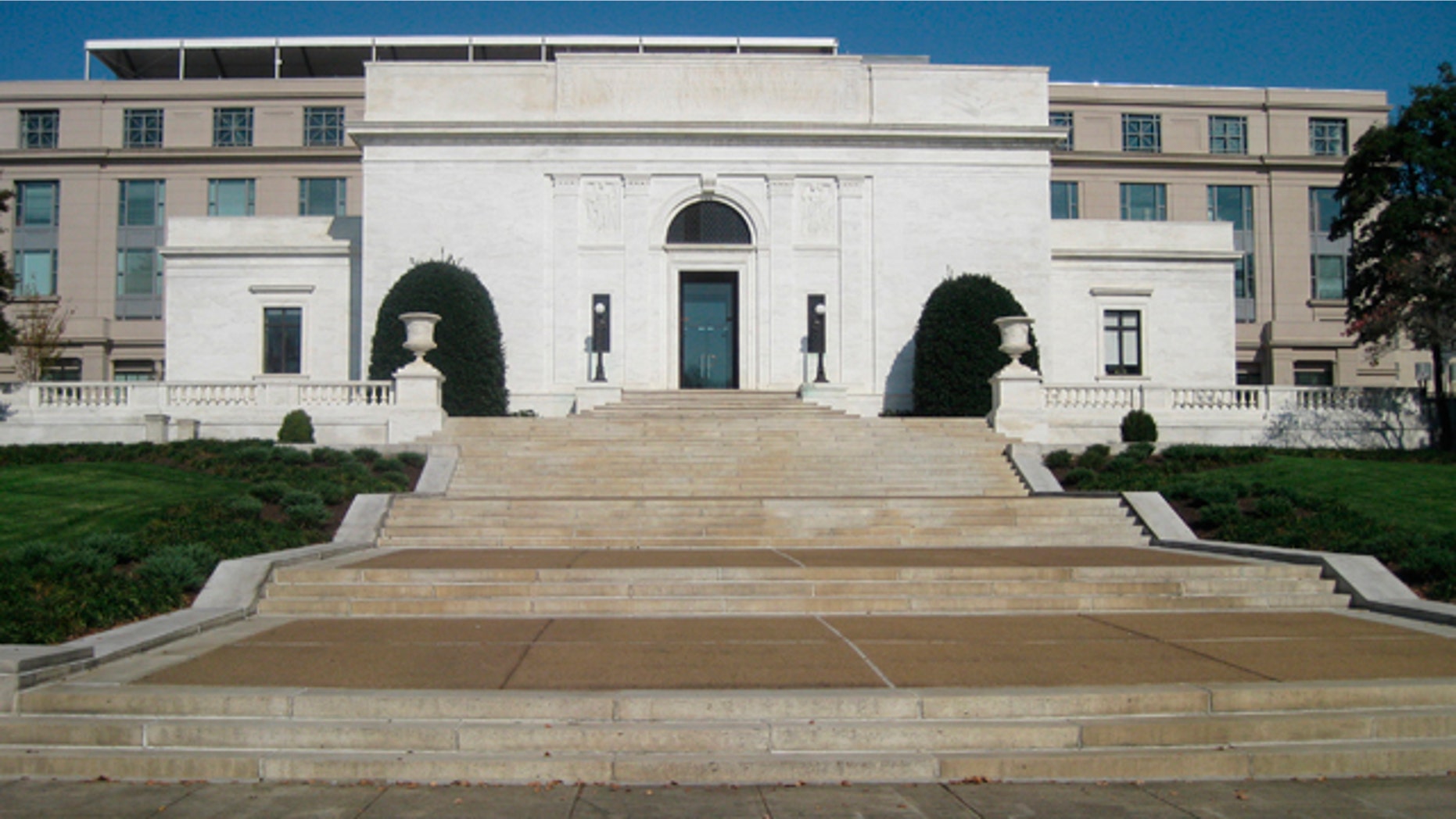 The American Pharmaceutical Association is seen in Washington in this photo taken Nov. 4, 2009. The capital is a city of magnificent front entrances that people can't enter. On Constitution Avenue, Pennsylvania Avenue and Capitol Hill, sweeping marble staircases, sculptures, manicured gardens and ornate doors beckoned citizens of the past. Now most stand empty and sealed, a forbidden welcome. (AP Photo/Cal Woodward)