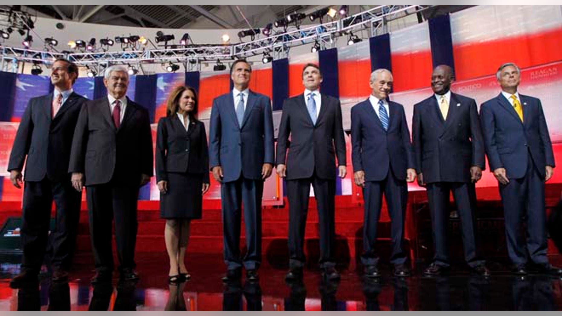 Republican presidential candidates, from left to right: former Pennsylvania Sen. Rick Santorum, former House Speaker Newt Gingrich, Rep. Michele Bachmann, R-Minn., former Massachusetts Gov. Mitt Romney, Texas Gov. Rick Perry, Rep. Ron Paul, R-Texas, Businessman Herman Cain and former Utah Gov. Jon Huntsman.