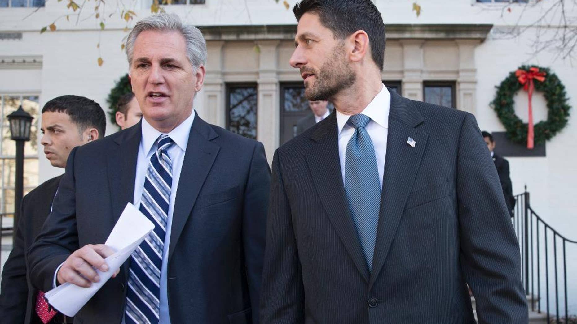 Speaker of the House Paul Ryan, R-Wis., right, and Majority Leader Kevin McCarthy, R-Calif., leave a news conference following a GOP caucus meeting, at the Republican National Headquarters on Capitol Hill in Washington, Tuesday, Dec. 8, 2015. Ryan dismissed Republican presidential candidate Donald Trump's comments on Muslims, saying such views are "not what this party stands for and more importantly it's not what this country stands for." (AP Photo/J. Scott Applewhite)