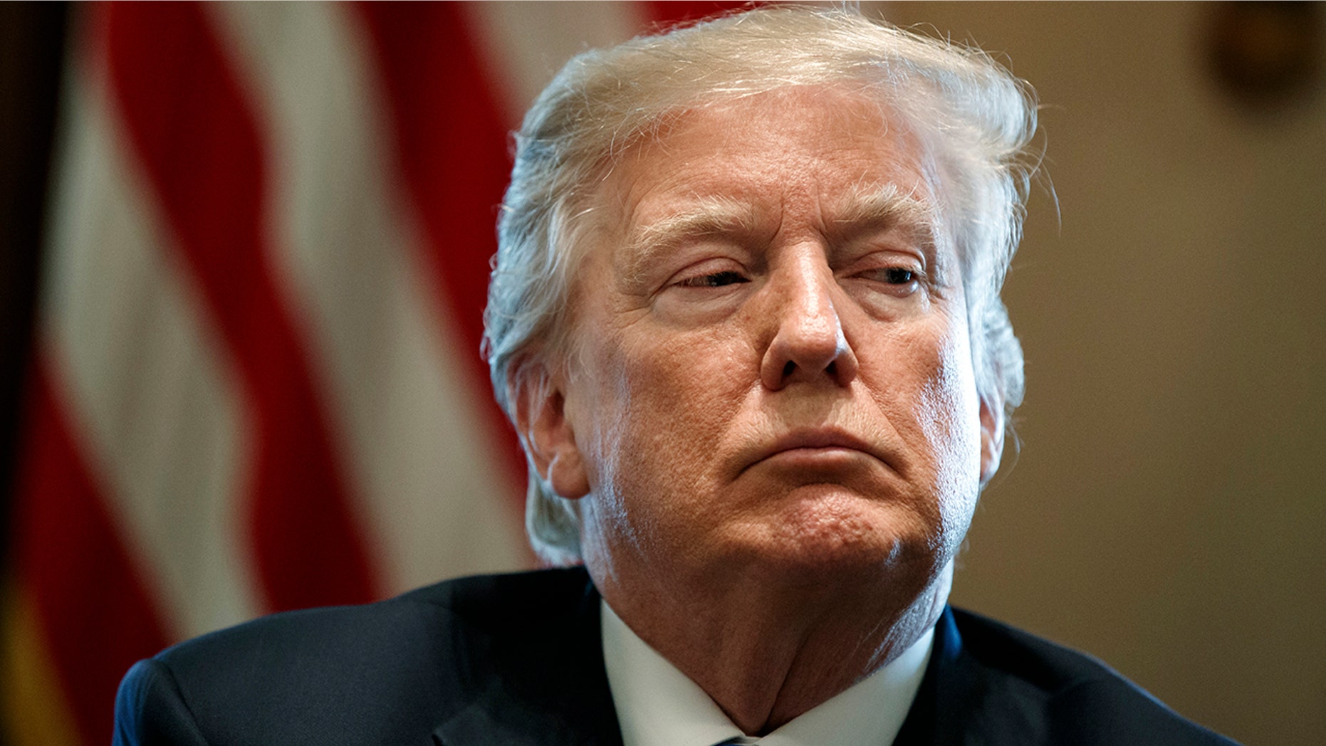 FILE- In this Jan. 9, 2018, file photo, President Donald Trump listens during a meeting with lawmakers on immigration policy in the Cabinet Room of the White House in Washington. Trump used profane language Thursday, Jan. 11, as he questioned why the U.S. should permit immigrants from certain countries, according to three people briefed on the conversation. The White House did not deny the comment. (AP Photo/Evan Vucci, File)