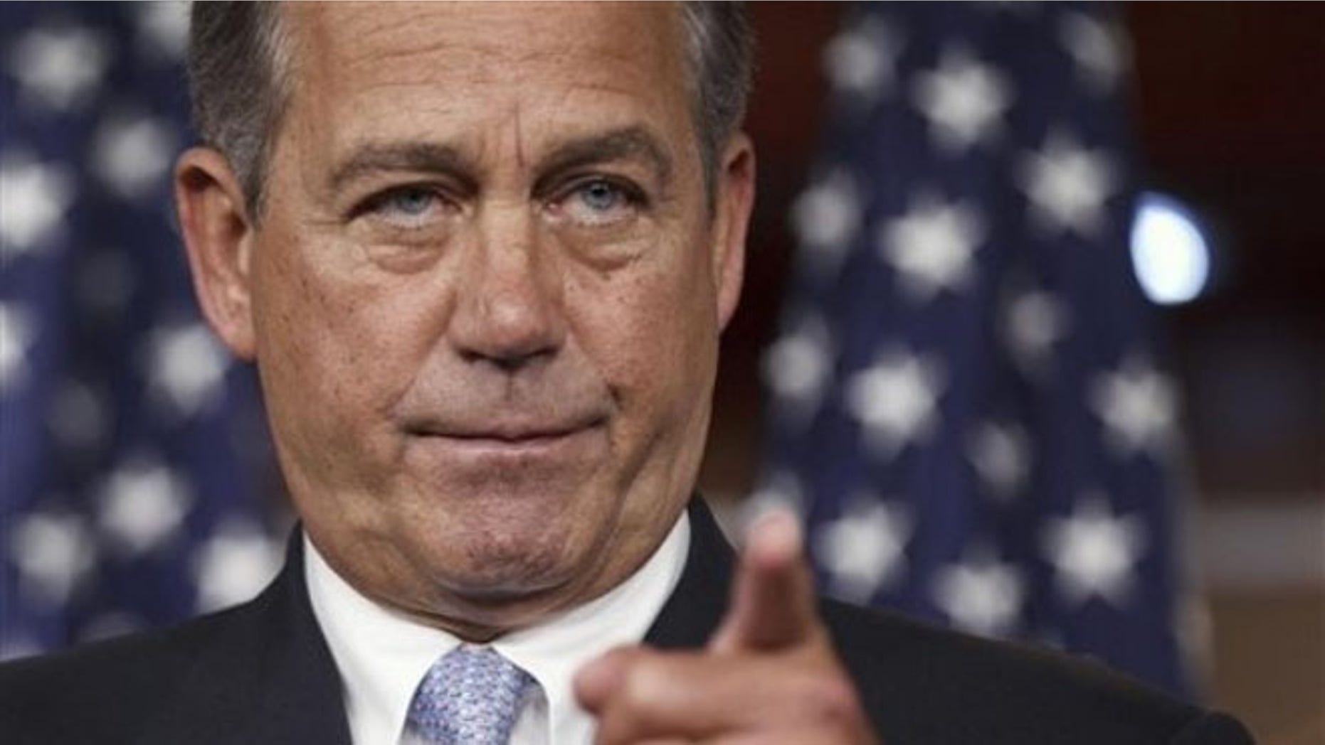FILE: House Speaker John Boehner takes questions during a news conference on Capitol Hill, in Washington, D.C.