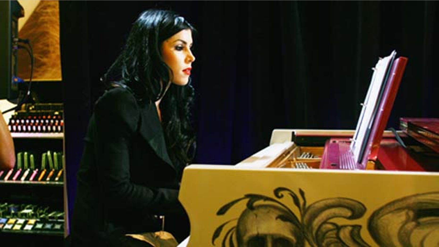 Sept. 8, 2011: Tattoo artist and TV star Kat Von D entertains the guests by playing the piano during Sephora Times Square & Sephora 5 Times Square Fashion's Night Out at Sephora Times Square in New York City.
