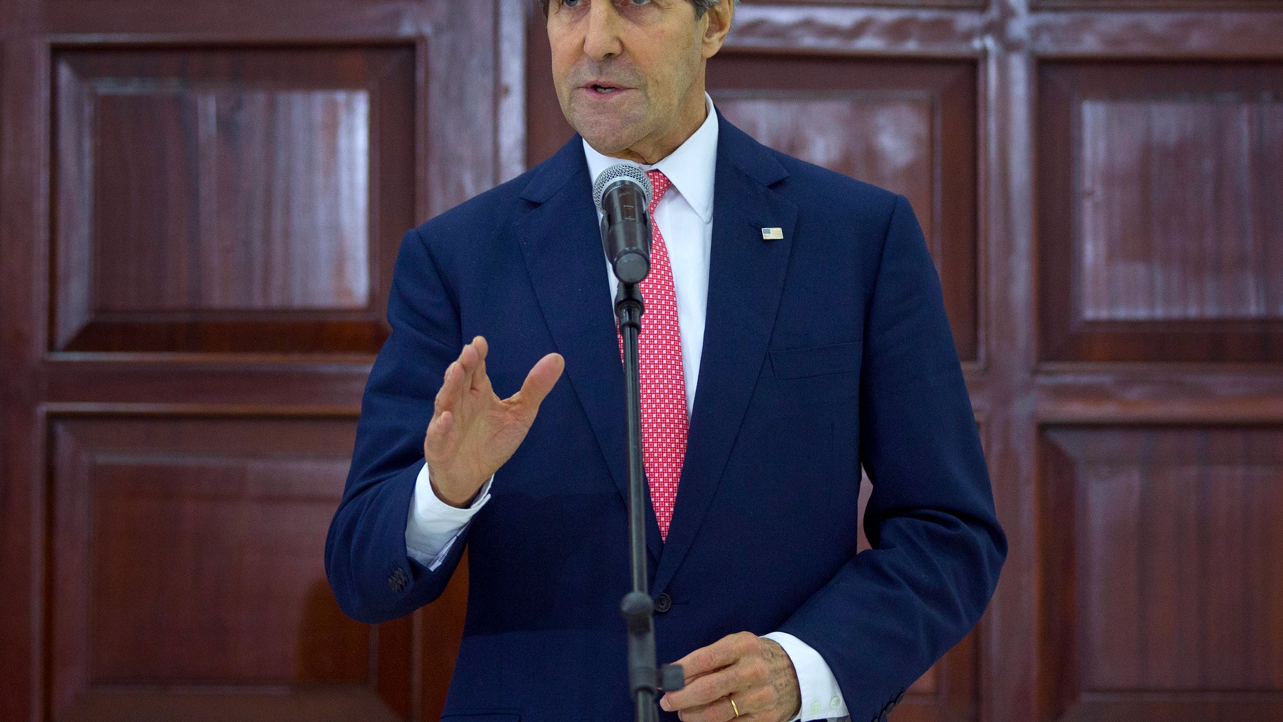 Secretary of State John Kerry speaks at the Presidential Compound in the West Bank city of Ramallah, Thursday, Dec. 5, 2013, following the conclusion of his meeting with Palestinian President Mahmoud Abbas. Kerry is visiting Jerusalem and Ramallah to discuss Israeli-Palestinian peace and to consult Israeli officials about Iran. (AP Photo/Pablo Martinez Monsivais, Pool)