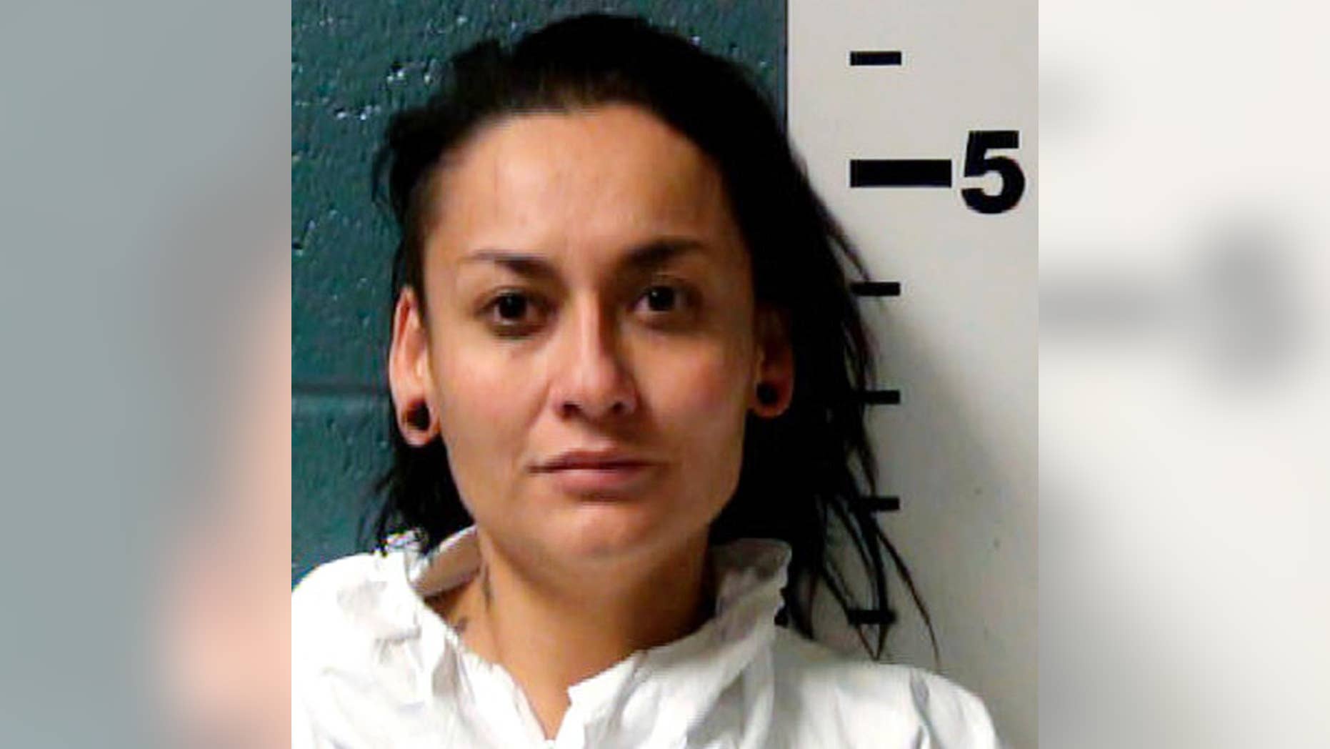 This undated photo provided by the Dona Ana County Detention Center shows Kayla Bailey. Bailey is accused of using knives and a chain saw to stab and cut her boyfriend after restraining him inside his car in Las cruces, N.M., Monday, Nov. 28, 2016. (Dona Ana County Detention Center via AP)