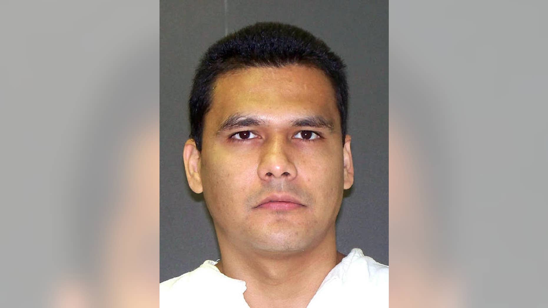 This undated handout photo provided by the Texas Department of Criminal Justice shows Manuel Garza Jr. Garza is scheduled to be executed for the 2001 shooting death of San Antonio, Texas, SWAT officer John “Rocky” Riojas. (Texas Department of Criminal Justice via AP)