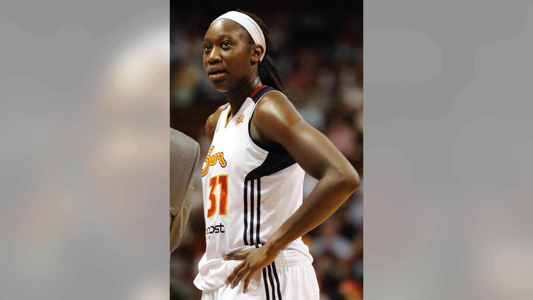 FILE - In this July 11, 2012 file photo, Connecticut Sun's Tina Charles looks up during a timeout in the second half of a WNBA basketball game against the Washington Mystics in Uncasville, Conn. After the 2013 season, the Sun dealt the former Rookie of the Year and 2012 league MVP Tina Charles to the New York Liberty after she demanded a trade. The Sun will host New York as they open the season Friday, May 16, 2014 in Uncasville. (AP Photo/Jessica Hill, File)