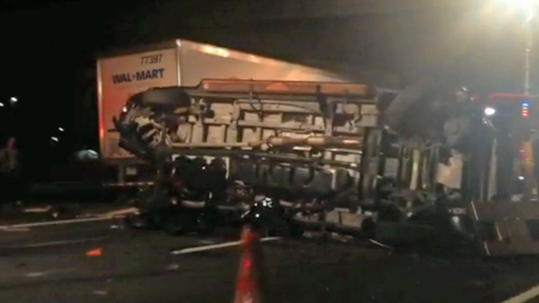June 7, 2014. In this image from video the limousine bus carrying Tracy Morgan and six other people lies on its side early Saturday morning on the New Jersey Turnpike.
