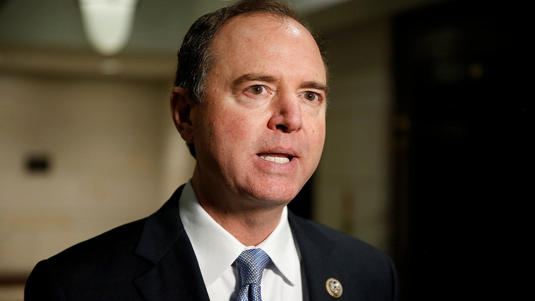 U.S. Rep. Adam Schiff, D-Calif., addresses reporters on Capitol Hill in Washington, Nov. 30, 2017.