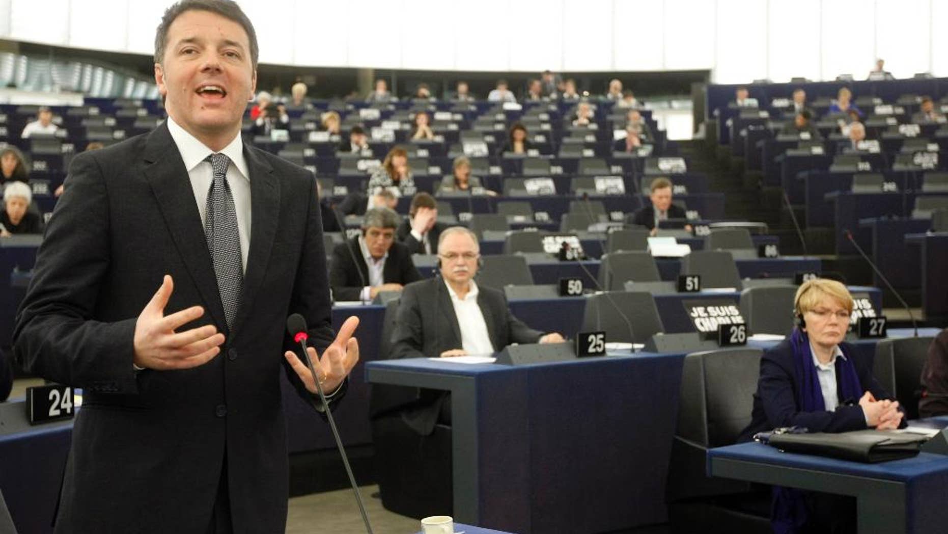 Italian Prime Minister Matteo Renzi delivers a speech at the European Parliament in Strasbourg, eastern France, Tuesday Jan. 13, 2015. Renzi reviewed the outgoing EU presidency. (AP Photo/Christian Lutz)