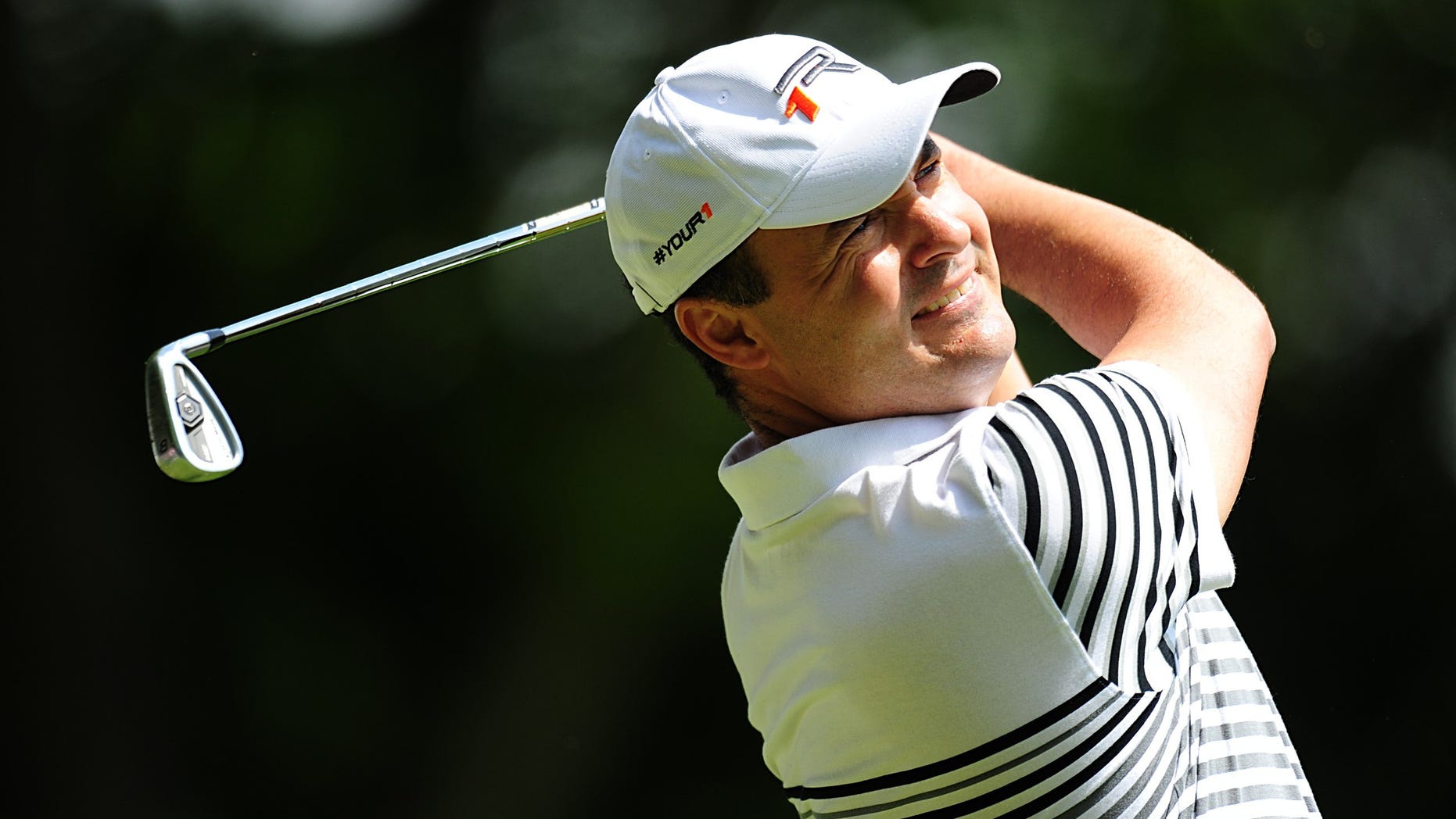 England's Simon Khan in action during round four on day four of the PGA Championship at the Wentworth Club, in Virginia Water, England, Sunday May 26, 2013. (AP Photo/Adam Davy, PA) UNITED KINGDOM OUT - NO SALES - NO ARCHIVES