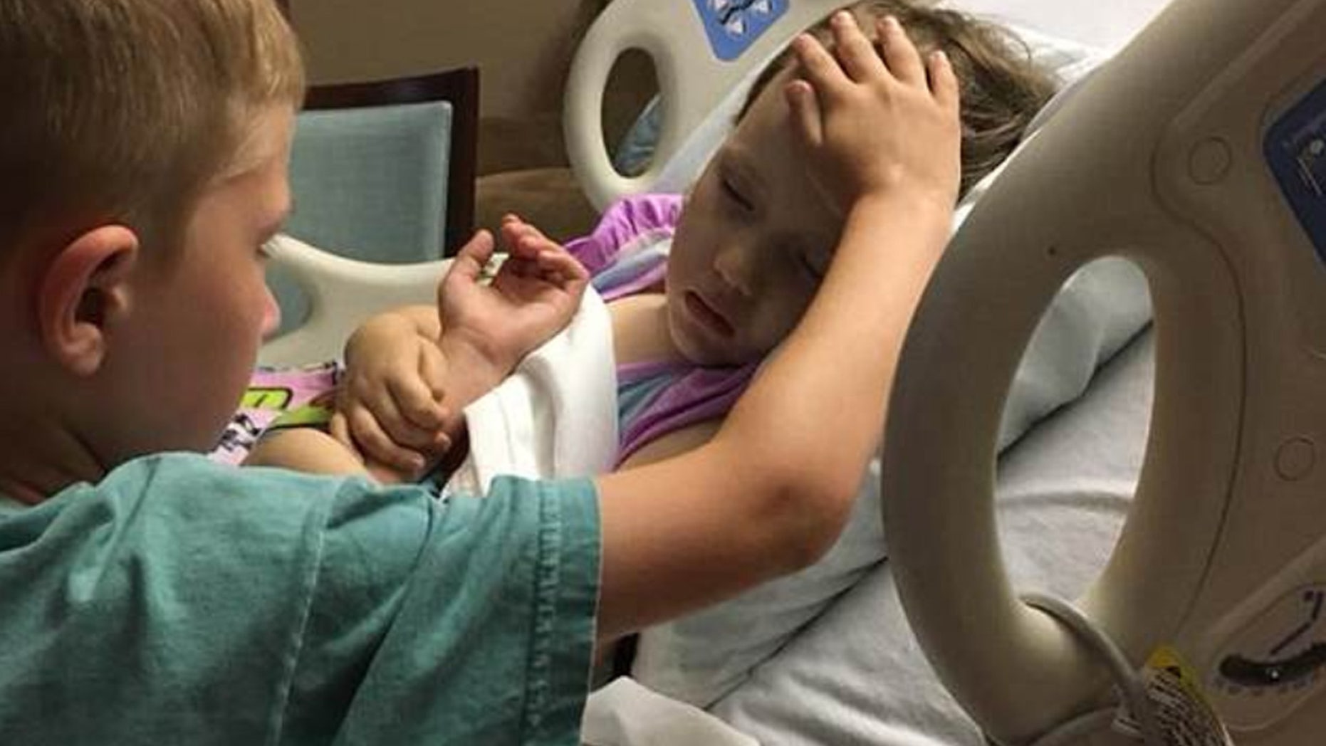 The father of a 4-year-old girl diagnosed with a brain tumor posted a painful photo of his son's last goodbye to his sister.