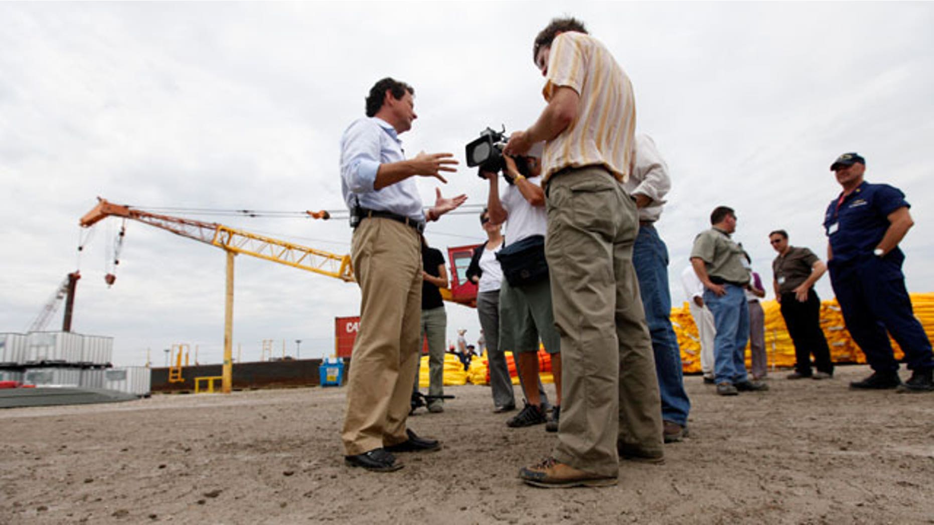 BP PLC CEO Tony Hayward talks to reporters as he visits a Coast Guard command center in Venice, La., Sunday, May 30, 2010.