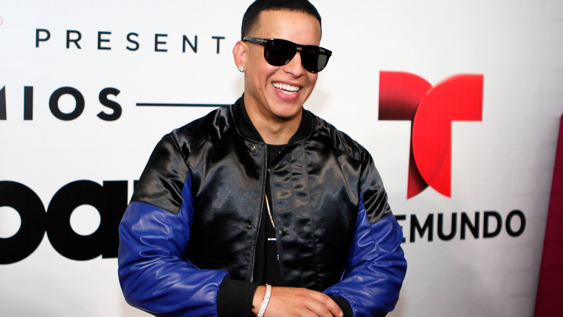 Daddy Yankee poses backstage at the 2015 Latin Billboard Awards in Coral Gables, Florida April 30, 2015.