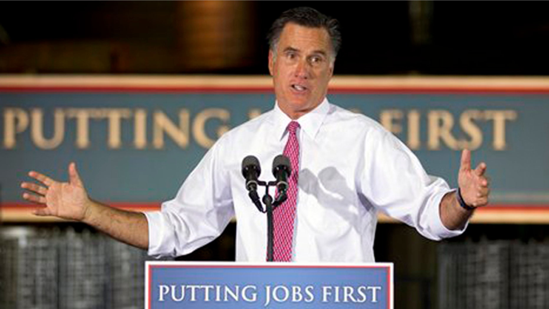 June 14, 2012: GOP presidential candidate Mitt Romney gestures during a campaign stop at Seilkop Industries in Cincinnati, Ohio.