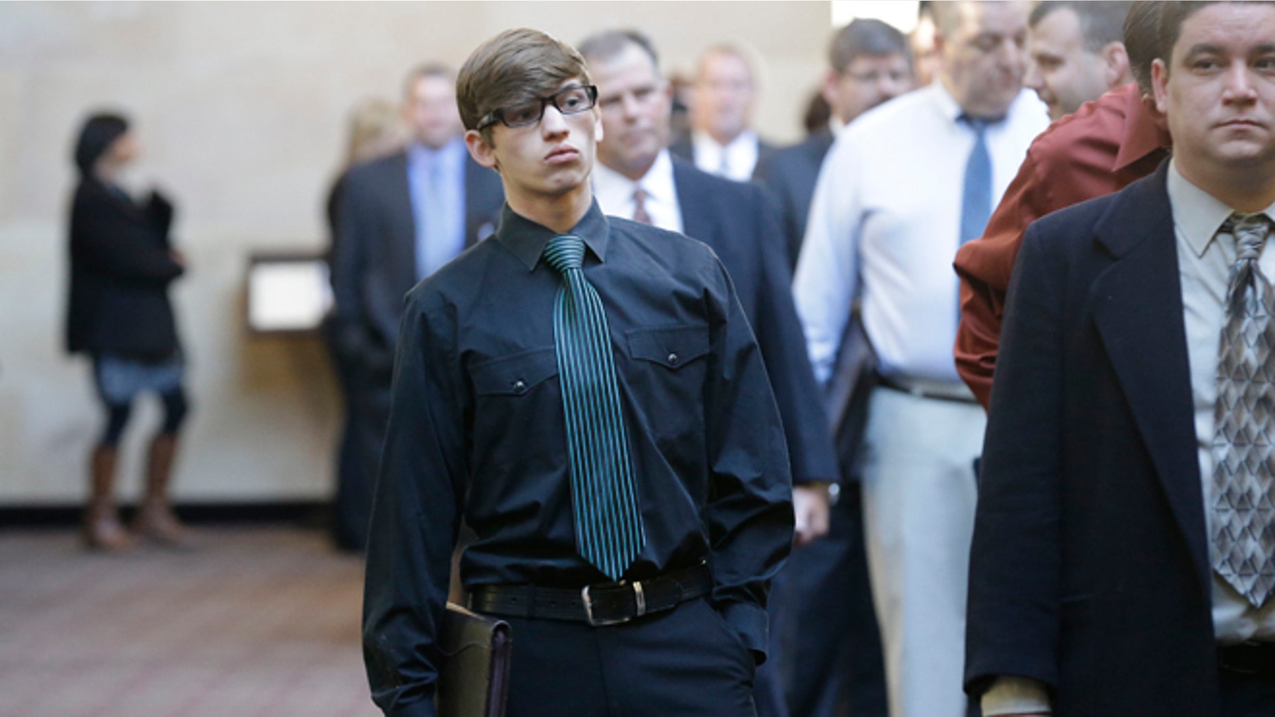Jan. 22, 2014: Job seekers stand in line during a career fair at a hotel in Dallas.