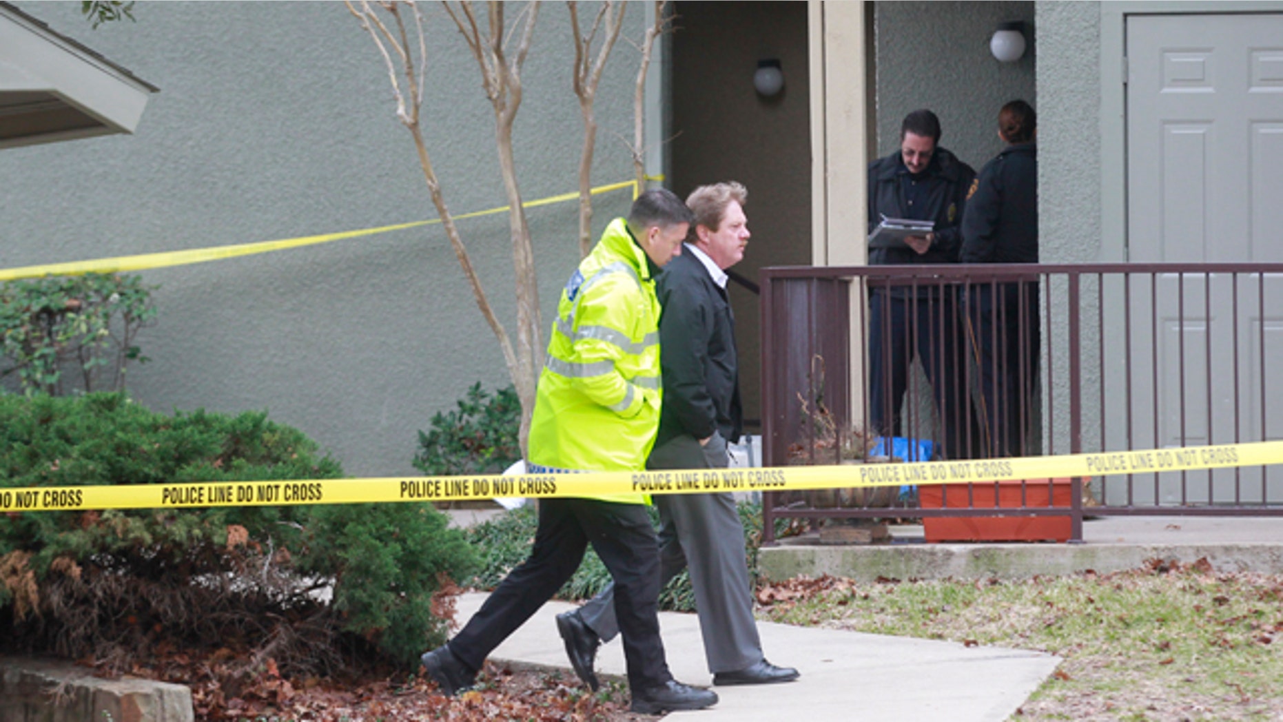 Dec. 25, 2011: Grapevine police investigate the scene where they found seven people dead outside Dallas in Grapevine, Texas.