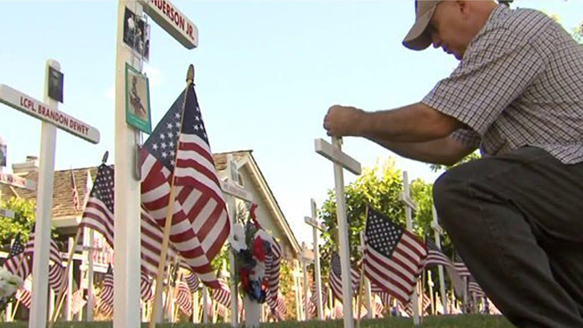 Dan Joseph remembers those from Central California who were killed in Afghanistan and Iraq with front yard Memorial Day display. (Fox40)
