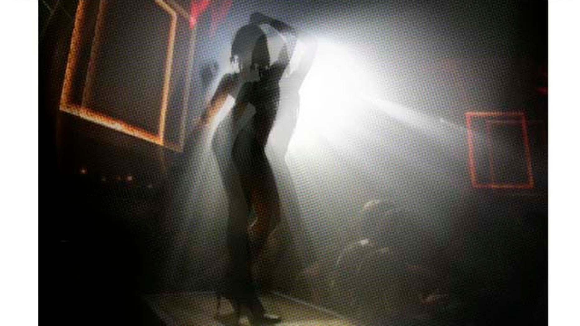 ** FOR IMMEDIATE RELEASE **A girl dances on a platform at the Mansion nightclub in Miami Beach, Fla., Nov. 10, 2006. (AP Photo/Lynne Sladky)