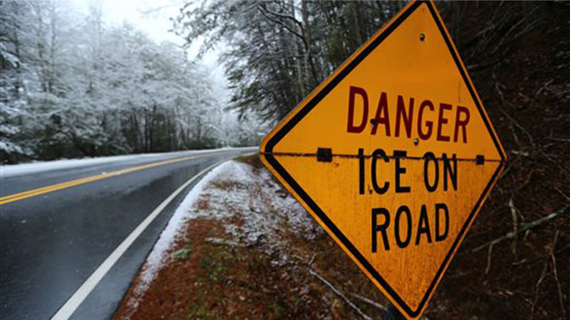 Richard Russell Scenic Hwy 348 is closed due to icy conditions on Tuesday, Feb. 11, 2014, just north of Helen, Ga. In a dire warning Tuesday, forecasters said a "catastrophic" winter storm threatened to bring a thick layer of ice to Georgia and other parts of the South, causing widespread power outages that could leave people in the dark for days. (AP Photo/Atlanta Journal-Constitution, Curtis Compton) MARIETTA DAILY OUT; GWINNETT DAILY POST OUT; LOCAL TV OUT; WXIA-TV OUT; WGCL-TV OUT
