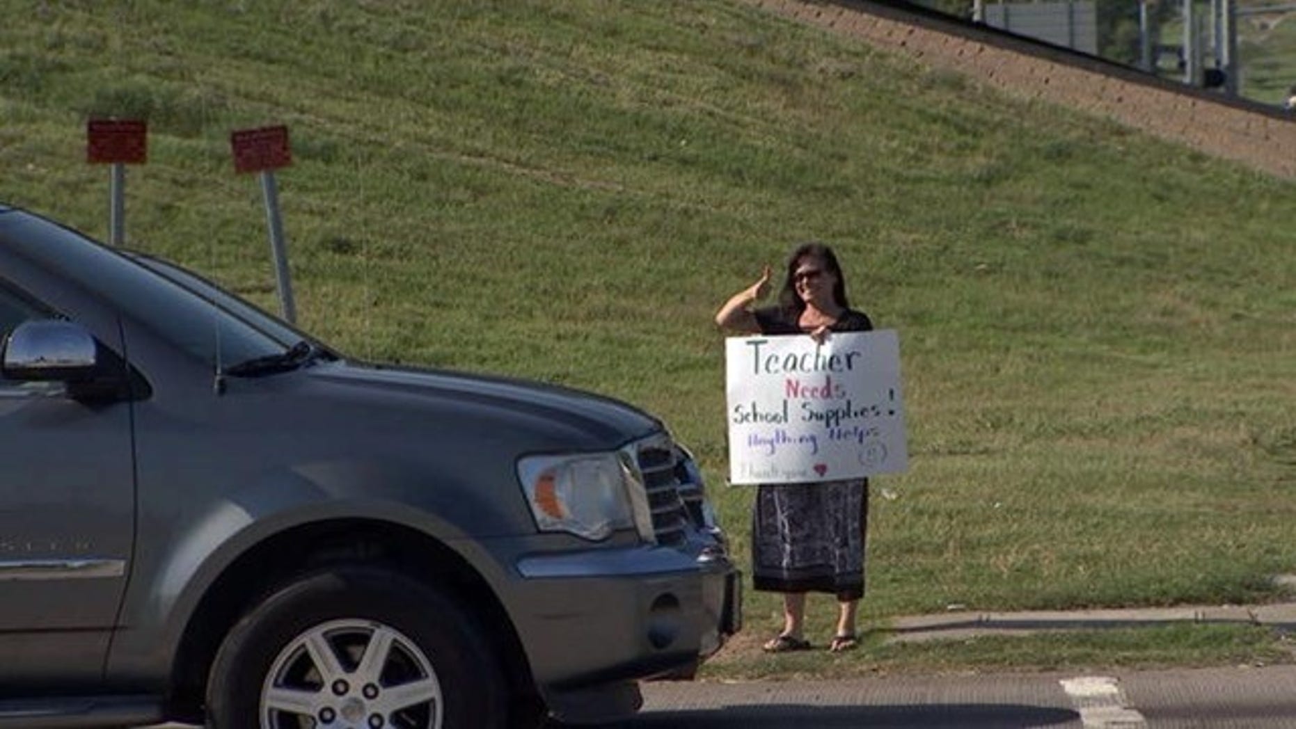 Tulsa, Okla., third-grade teacher Teresa Danks took to panhandling in order to raise money to buy classroom supplies.
