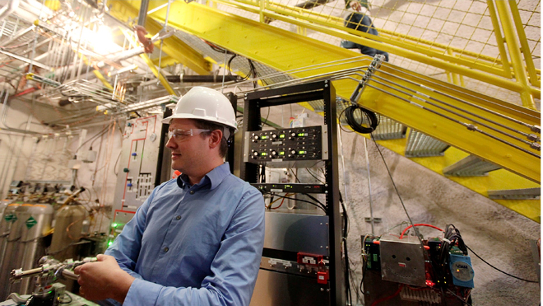 Oct. 29, 2013: Physicist Dan McKinsey, of Yale University, explains an experiment being conducted deep in an abandoned gold mine in Lead, S.D., to search for elusive and mysterious dark matter.