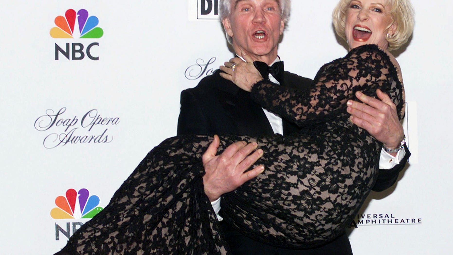 Actor David Canary holds Jennifer Bassey in his arms after they won the Favorite Couple award at the fifteenth annual Soap Opera Digest Awards, February 26 in Los Angeles. Canary plays Stuart and Bassey plays Marian on "All My Children." The awards show was broadcast live on the NBC television network.FSP/HB - RTRMC1F