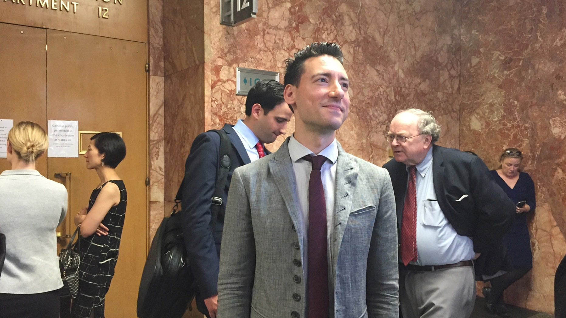 Anti-abortion activist David Daleiden, waits outside Superior Court in San Francisco, California, U.S., May 3, 2017. REUTERS/Lisa Fernandez - RTS151VV