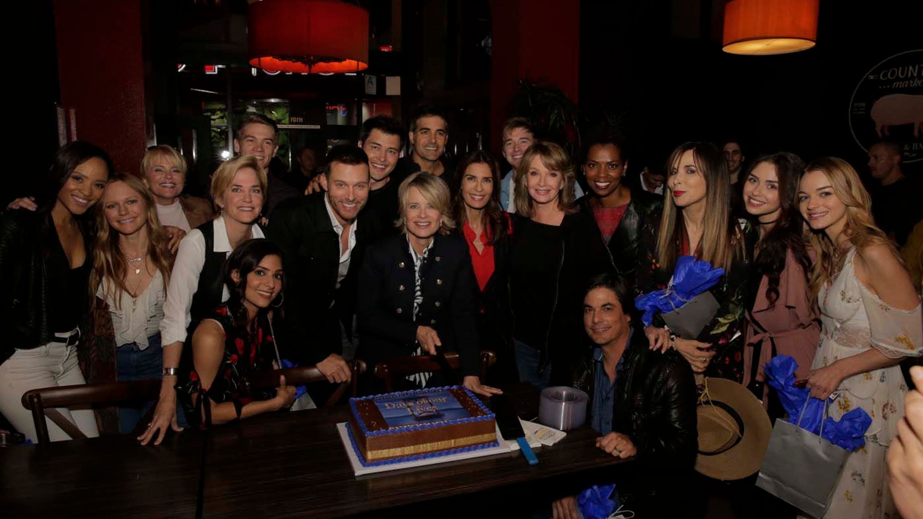 The cast poses at the "A Day of Days" event.