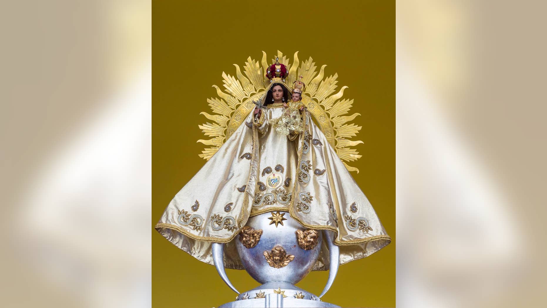 A statue of the Virgin of Charity sits on the altar where Pope Francis will celebrate a Mass, in the Plaza of the Revolution, in Havana, Cuba, Thursday, Sept. 17, 2015. Francis will honor Cuba’s patron the Virgin of Charity, Sept. 21 & 22 at a shrine outside Santiago. (AP Photo/Desmond Boylan)