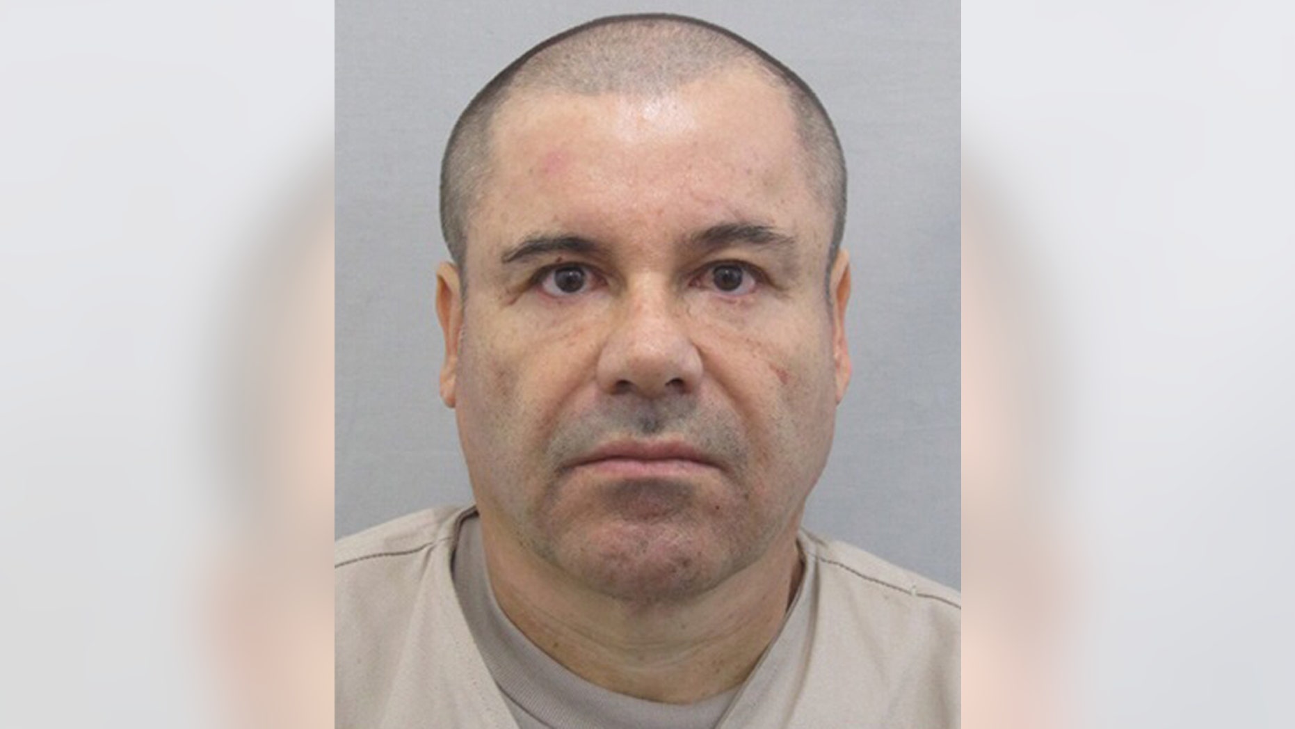 This photo provided by Mexico's attorney general, shows the most recent image of drug lord Joaquin "El Chapo" Guzman before he escaped from the Altiplano maximum security prison in Almoloya, west of Mexico City, Sunday, July 12, 2015. The Mexican government is offering a 60 million pesos (about $4 million dollars) reward for information leading to his capture, after Guzman, escaped from the maximum security prison through a mile long tunnel that opened into the shower area of his cell. (Mexico's Attorney General's Office via AP)
