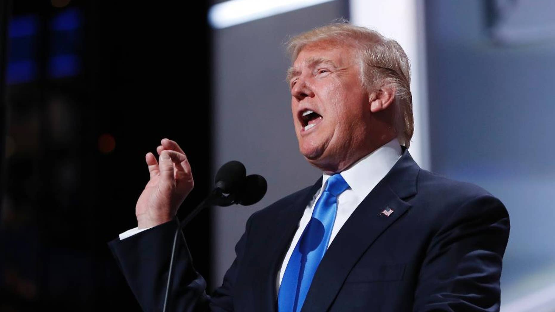 Republican Presidential Candidate Donald Trump speaks as he introduces his wife Melania Trump during first day of the Republican National Convention in Cleveland, Monday, July 18, 2016. (AP Photo/Carolyn Kaster)