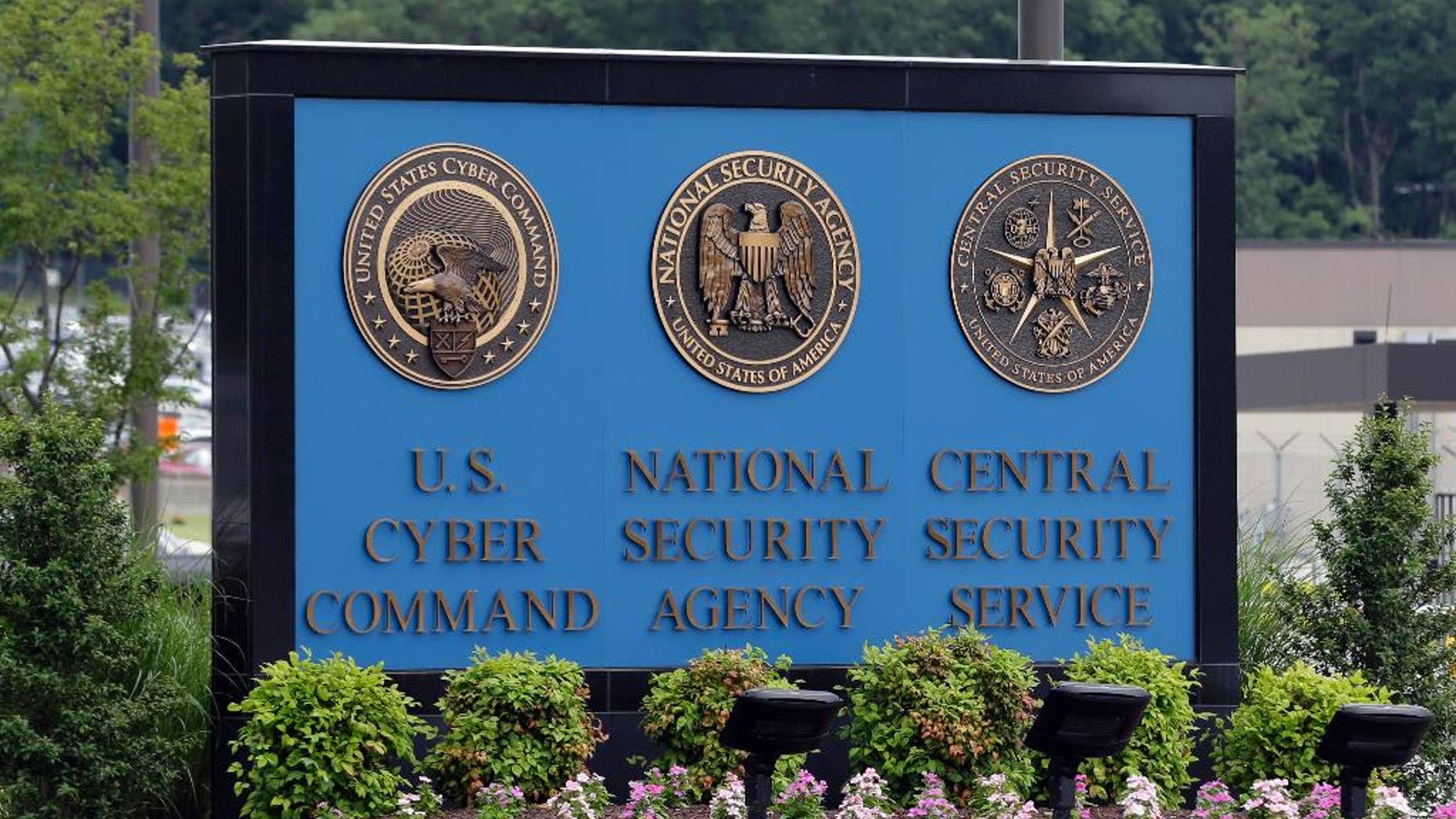 FILE - In this June 6, 2013, file photo, a sign stands outside the National Security Administration (NSA) campus on in Fort Meade, Md. The Obama administration has decided that the National Security Agency will soon stop using millions of American calling records it collected under a controversial program leaked by former agency contractor Edward Snowden. The Director of National Intelligence said July 27, that as of Nov. 29, those records would no longer be examined in terrorism investigations, and would be destroyed as soon as possible. (AP Photo/Patrick Semansky, File)