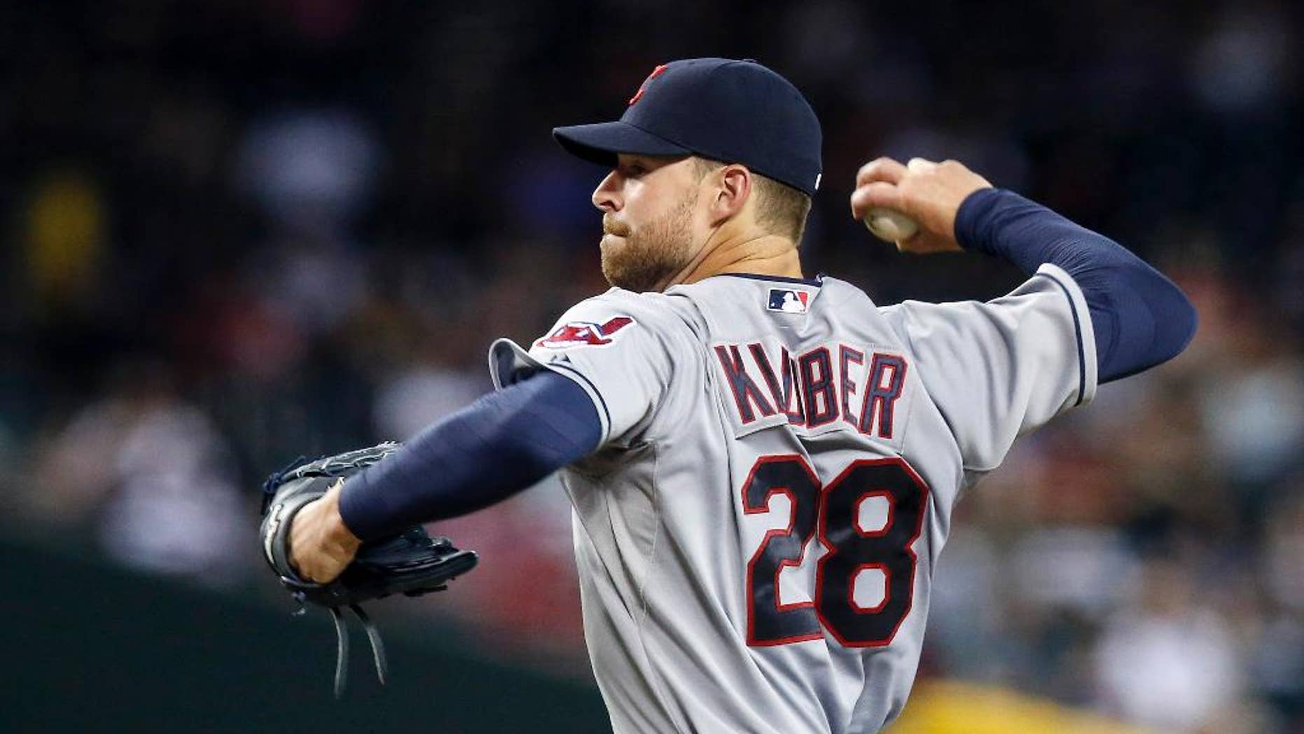 Cleveland Indians' Corey Kluber throws a pitch to the Arizona Diamondbacks during the first inning of a baseball game Wednesday, June 25, 2014, in Phoenix. (AP Photo/Ross D. Franklin)