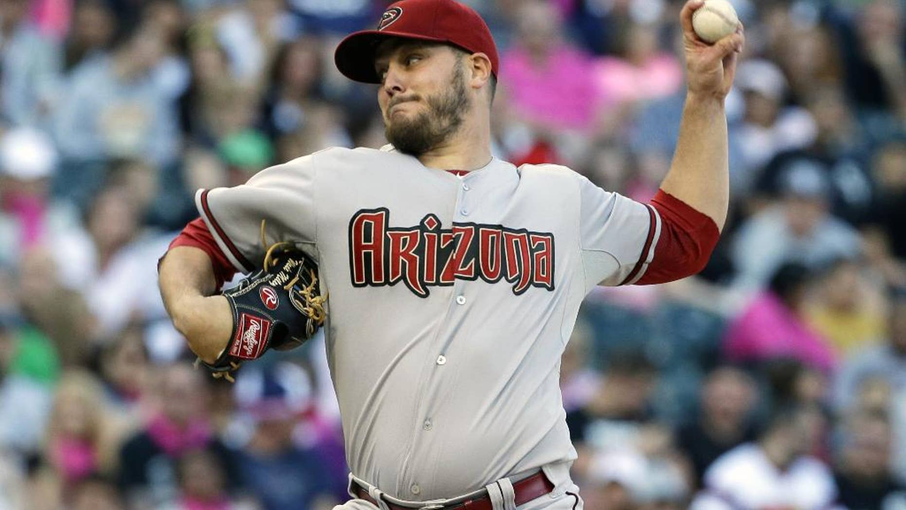 Arizona Diamondbacks starter Wade Miley throws against the Chicago White Sox during the first inning of an interleague baseball game in Chicago, Saturday, May 10, 2014. (AP Photo/Nam Y. Huh)