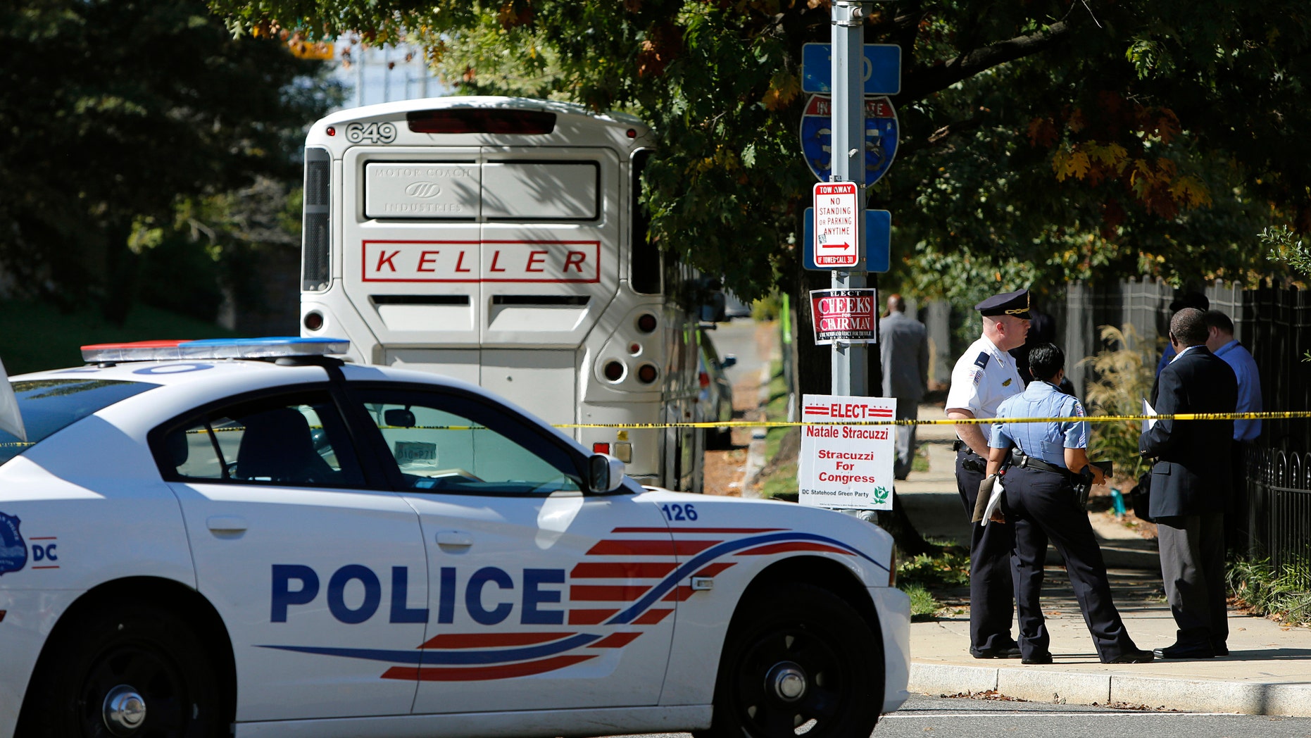 Oct. 17, 2014: A cordoned-off police area is seen near a charter bus after an Ebola scare in Washington.