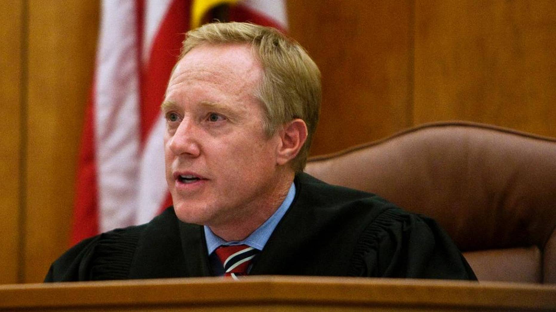 FILE - This Dec. 13, 2011, file photo, Judge Thomas Low speaks during a sentencing hearing at the 4th District Court in American Fork, Utah. A Utah judicial oversight commission representative says the number of comments about Low calling a convicted rapist a "good man" during his sentencing hearing has nearly tripled since Friday, April 14, 2017. Jennifer Yim said Monday, April 17, 2017, that she has received in total about 120 emails, phone calls and Facebook messages about Judge Thomas Low. The messages started coming in late March when Low came under scrutiny for letting Keith Robert Vallejo out of custody after a jury found him guilty of 10 counts of forcible sexual abuse and one count of object rape.(Chris Detrick/The Salt Lake Tribune, via AP, Pool, File)