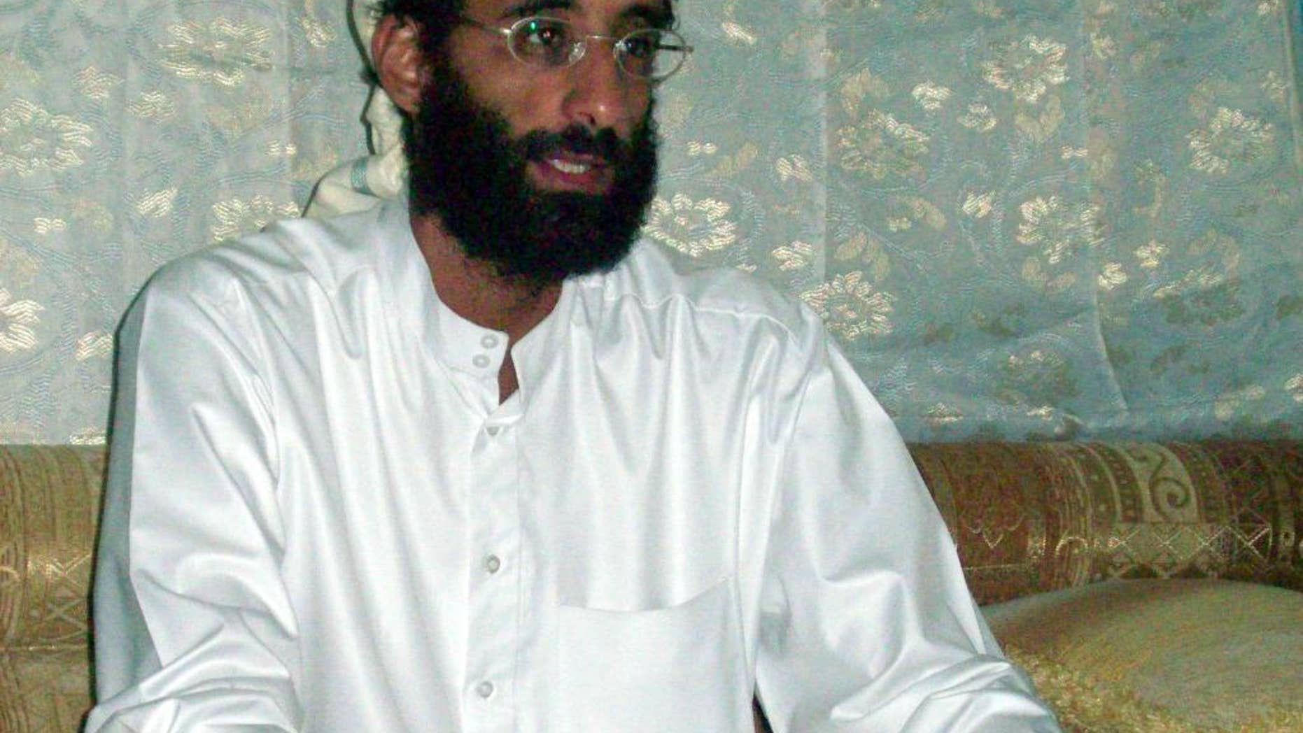 FILE - This October 2008, file photo shows Imam Anwar al-Awlaki in Yemen. Investigators say the blast that rocked New York's Chelsea neighborhood on Sept. 17, 2016, that injured more than two dozen people, was the latest in a long line of incidents in which the attacker was inspired by al-Awlaki, the American imam-turned al-Qaida propagandist who was killed by a U.S. drone strike five years ago. (AP Photo/Muhammad ud-Deen, File)
