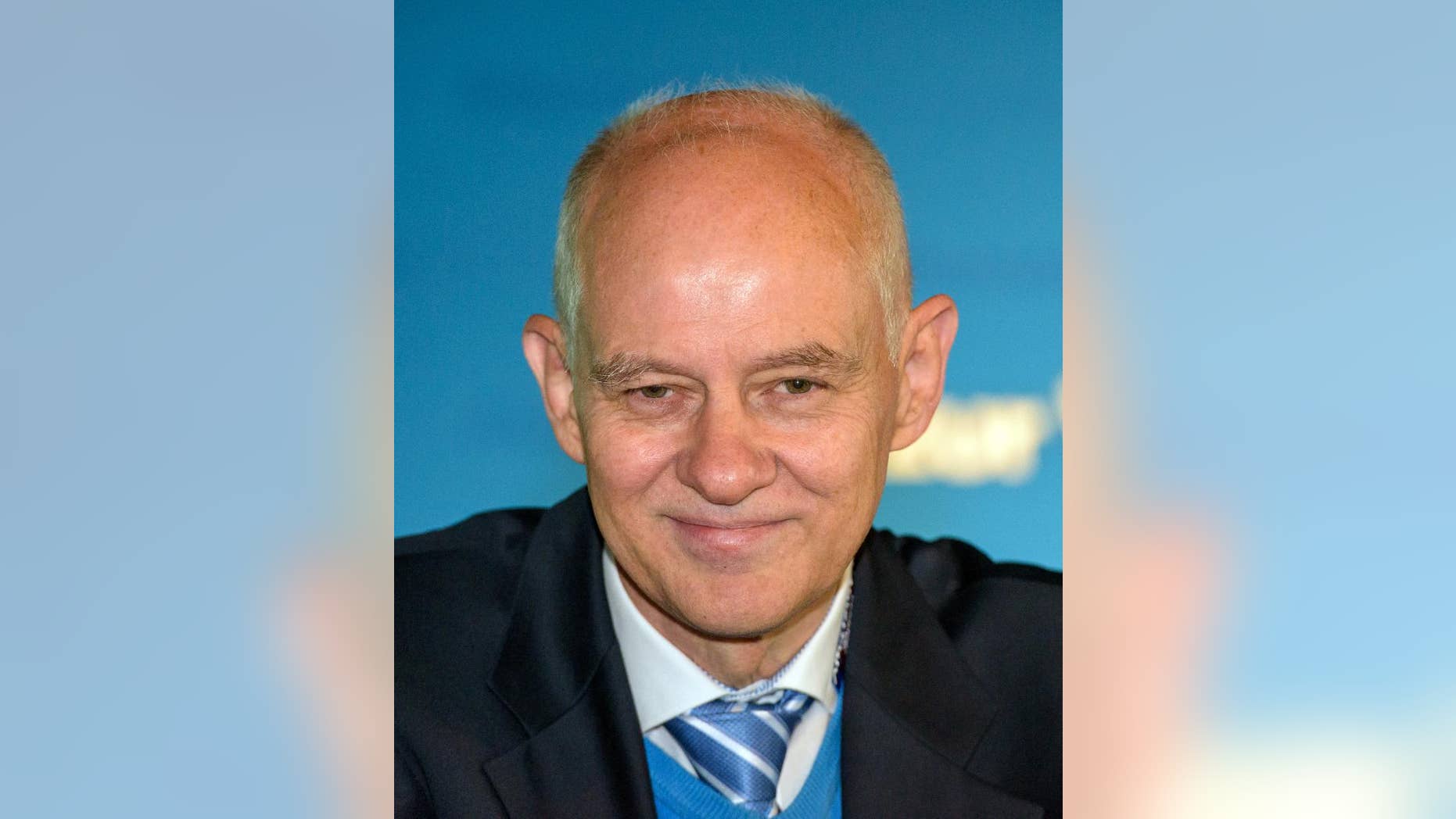 FILE - In this July 3, 2016 file photo top candidate of the nationalist party Alternative for Germany, AfD, for elections in the western state of Saarland next year Rudolf Mueller poses for a photo in Voelklingen, Germany. Mueller allegedly sold medals and currency used in Nazi internment camps at his antiques store. Saarbruecken prosecutors said Thursday, Sept. 22, 2016, that they are probing whether Mueller broke the law banning the use of symbols deemed to be in breach of Germany's constitution. (Oliver Dietze/dpa via AP, file)