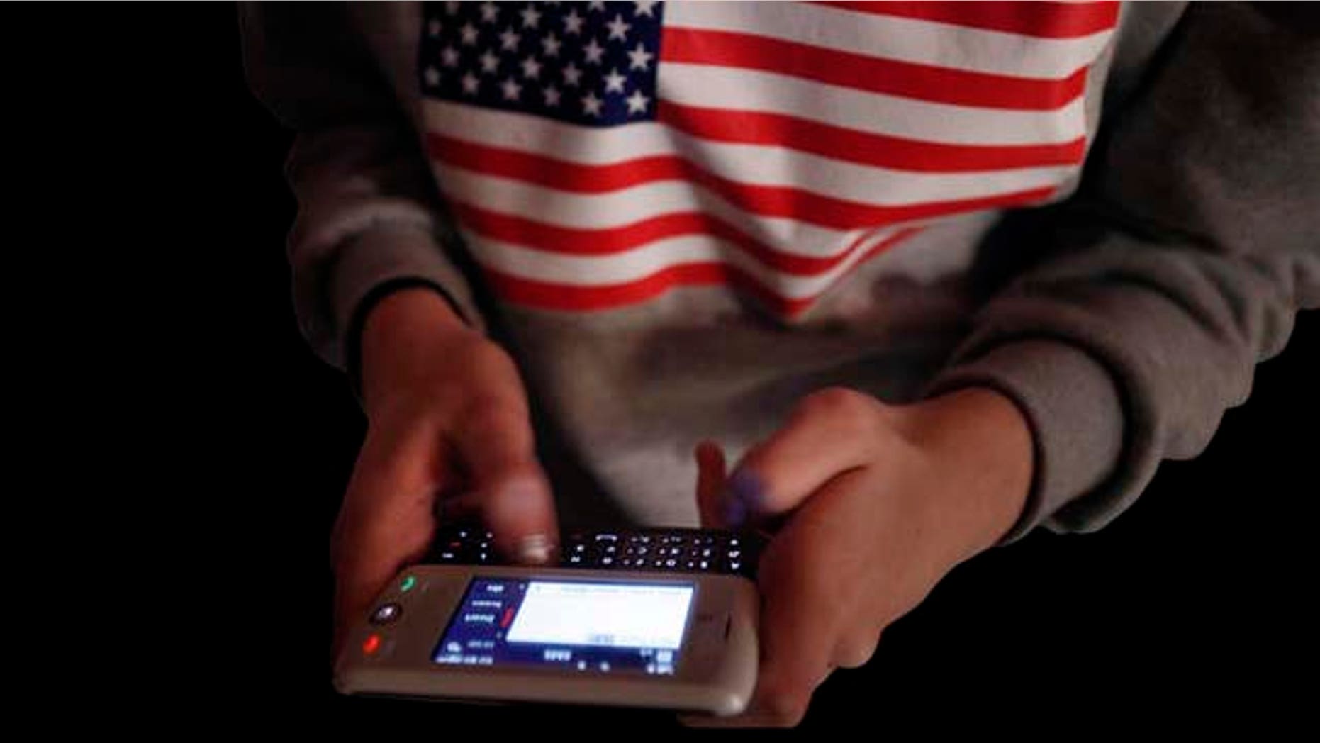 American competitor Kate Moore, 16, texts friends before the start of the LG Mobile Worldcup World Championship in New York, Thursday, Jan. 14, 2010. The Koreans won the top prize in the competition, which tested the speed and accuracy of the participants typing messages on mobile phones. (AP Photo/Seth Wenig)