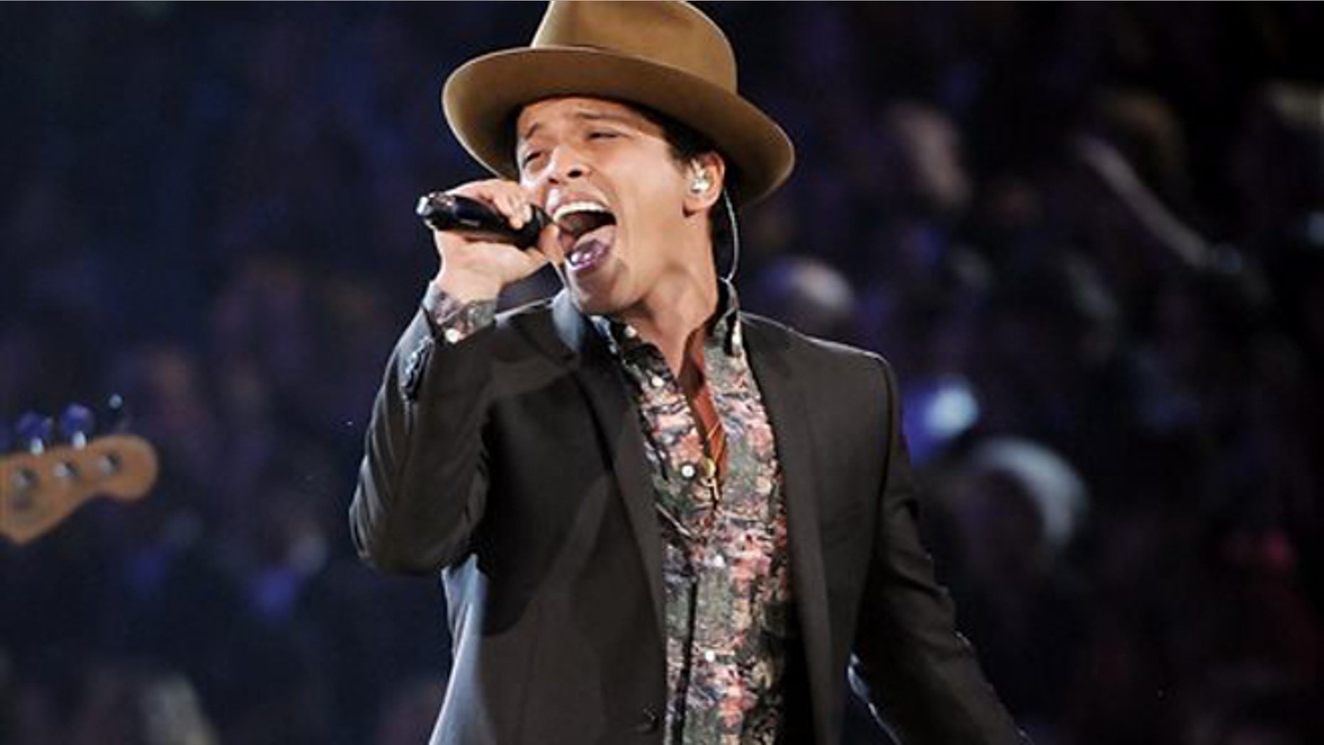 FILE - In this Nov. 7, 2012 file photo, Bruno Mars performs during the 2012 Victoria's Secret Fashion Show in New York. Mars will perform at this year's Super Bowl. (Photo by Evan Agostini/Invision/AP)