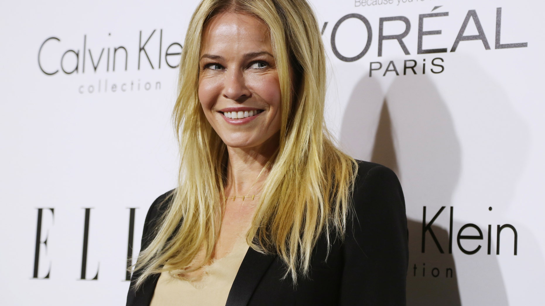 October 21, 2013. Talk show host and actress Chelsea Handler arrives as a guest at the 20th anniversary of ELLE Women in Hollywood event in Los Angeles.