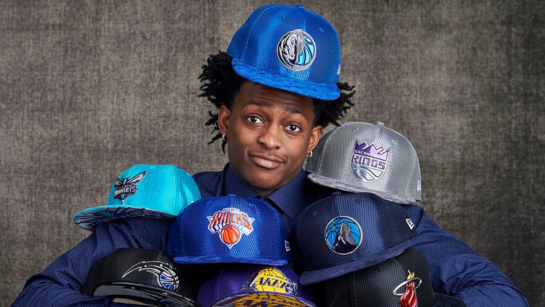 NEW YORK, NEW YORK - MAY 16: Draft prospects De'Aaron Fox poses with draft caps for portraits prior to the 2017 NBA Draft Lottery at the NBA Headquarters in New York, New York. NOTE TO USER: User expressly acknowledges and agrees that, by downloading and or using this Photograph, user is consenting to the terms and conditions of the Getty Images License Agreement. Mandatory Copyright Notice: Copyright 2017 NBAE (Photo by Jennifer Pottheiser/NBAE via Getty Images)