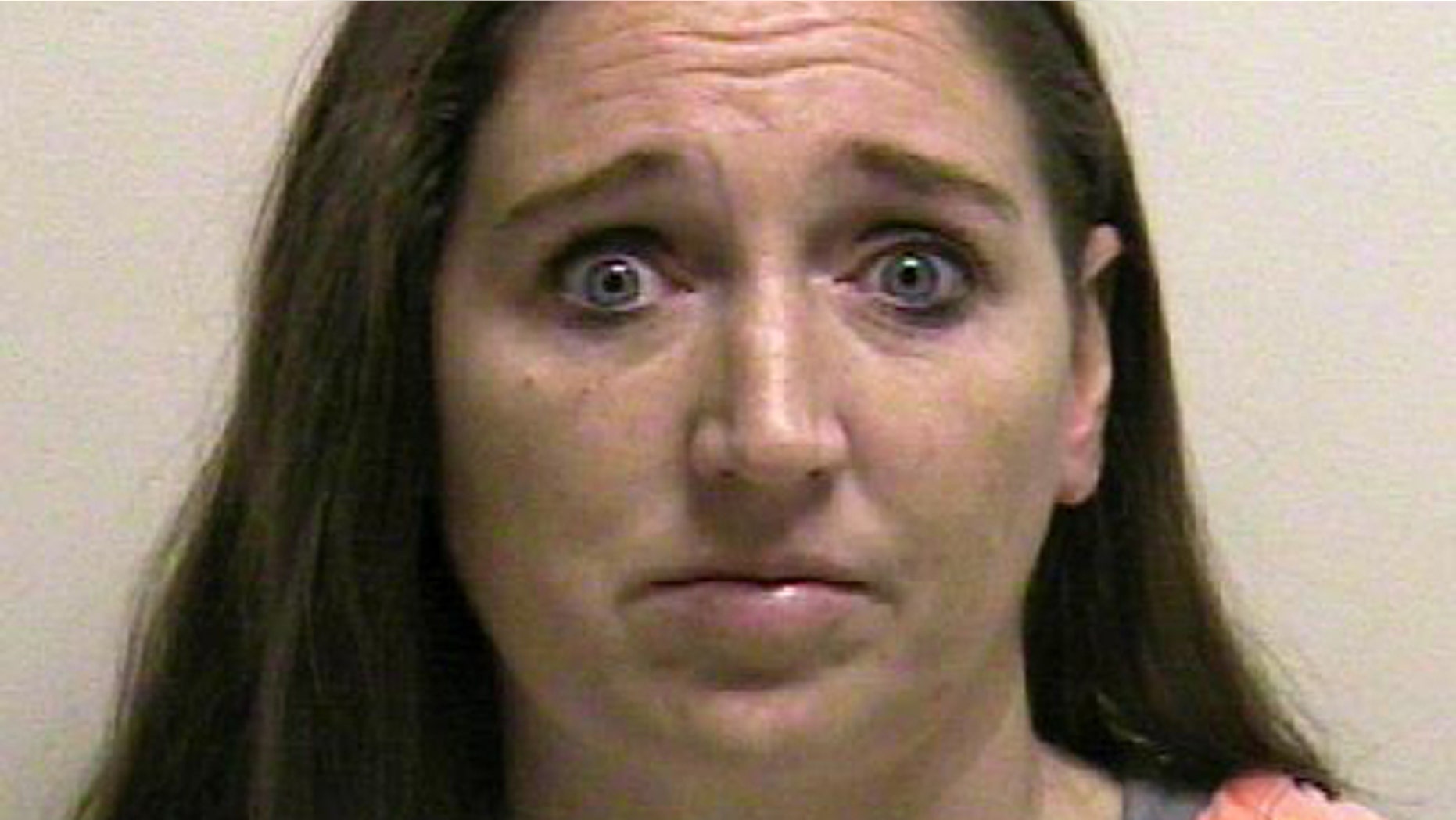 This photo provided by the Utah County jail shows Megan Huntsman, who was booked into the Utah County jail on suspicion of killing six of her newborn children over the past decade. Seven dead babies were found in a garage at a Pleasant Grove home where Huntsman lived up until 2011.
