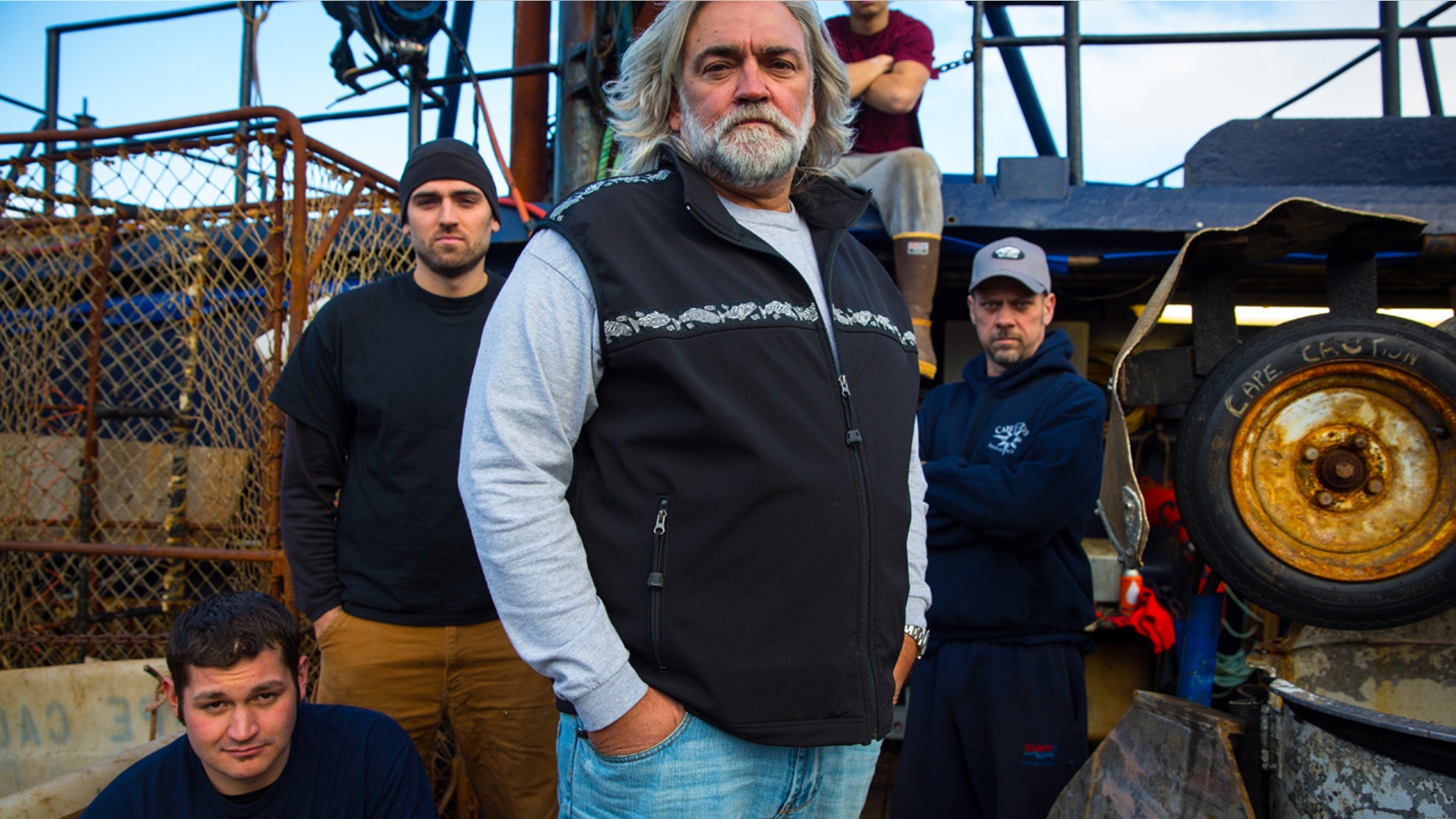 Captain Wild Bill Wichrowski (center) and his crew.