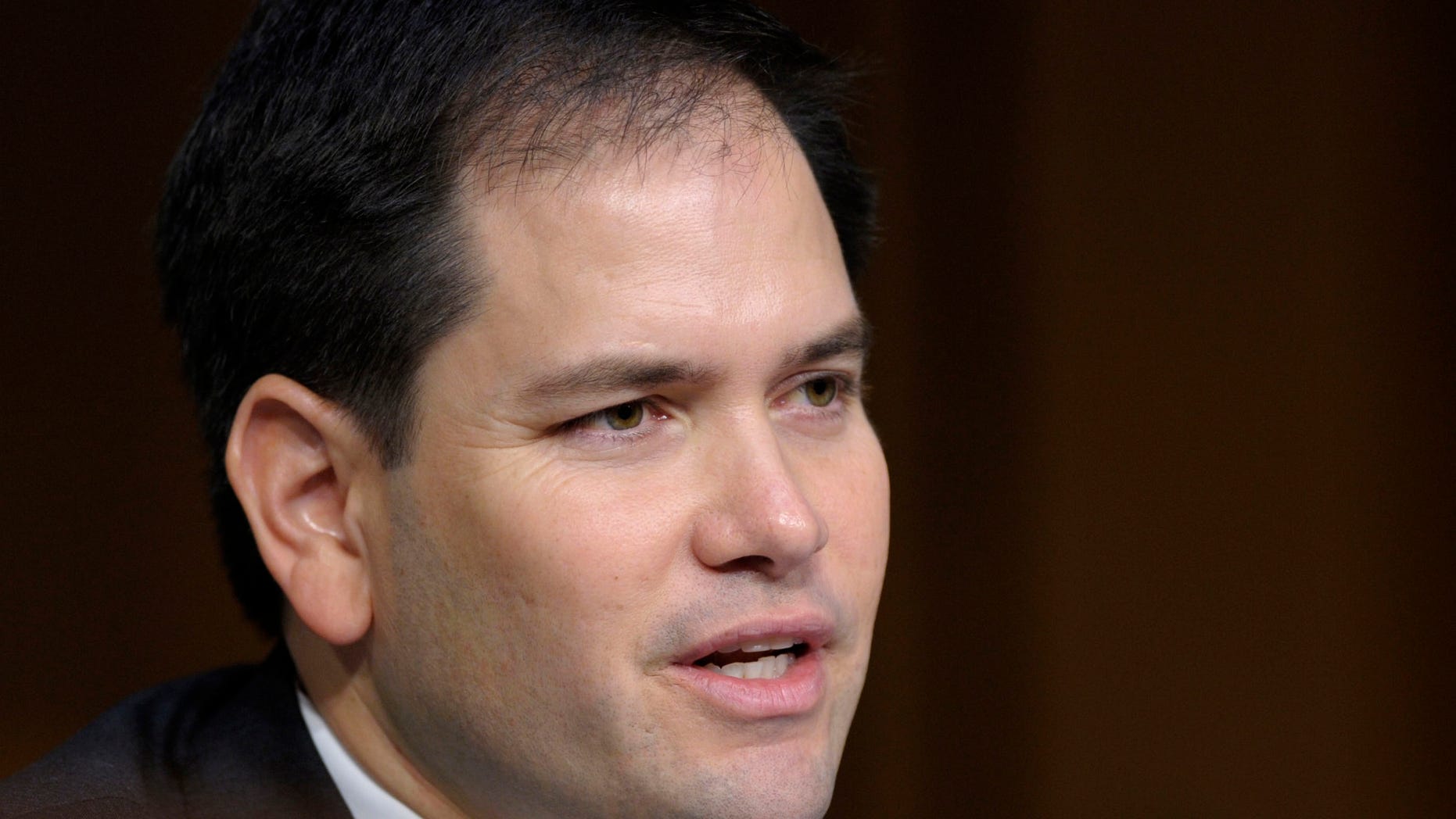 FILE - In this March 12, 2013 file photo, Sen. Marco Rubio, R-Fla., speaks on Capitol Hill in Washington. Rubio says a proposed immigration bill expected to be introduced this week won't offer amnesty to those who entered the U.S. illegally. Speaking on the news shows, Sunday, April 14, 2013, Rubio said, quote "there will be consequences for having violated the laws." (AP Photo/Susan Walsh, File)