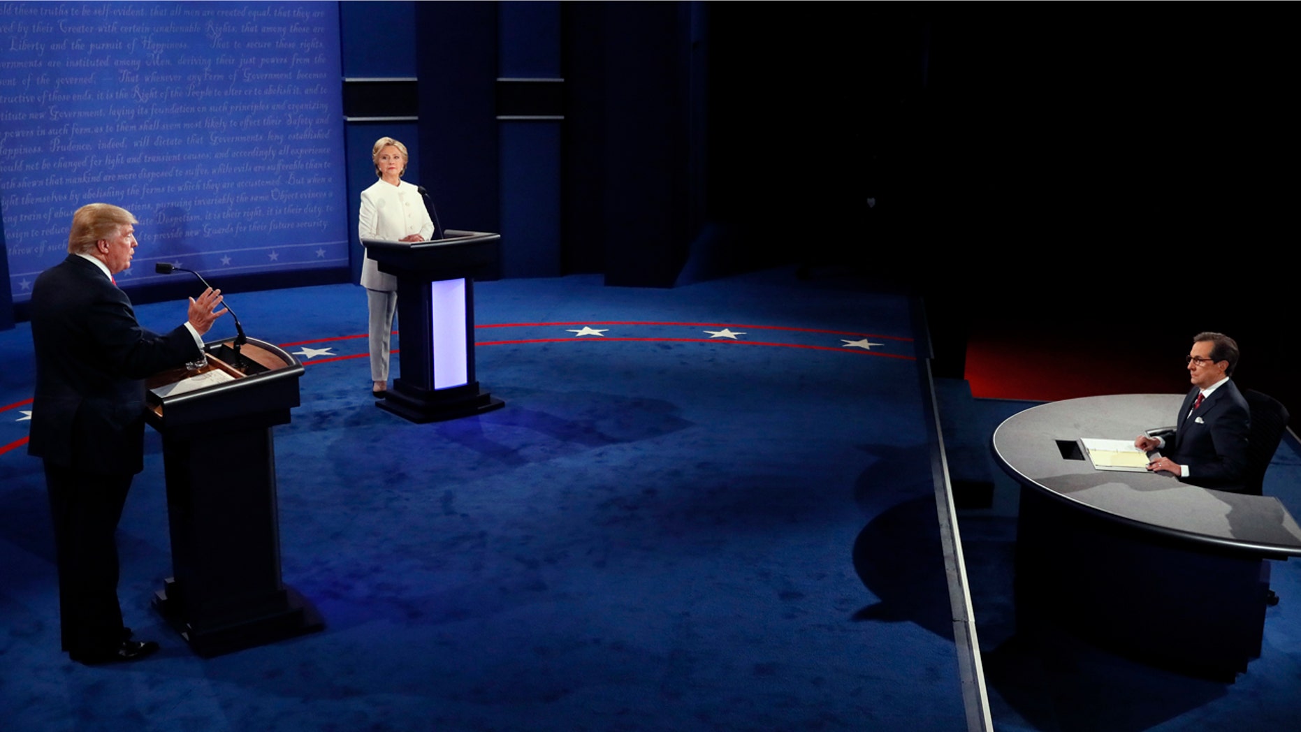 Democratic presidential nominee Hillary Clinton debates with Republican presidential nominee Donald Trump during the third presidential debate at UNLV in Las Vegas, Wednesday, Oct. 19, 2016. (Mark Ralston/Pool via AP)