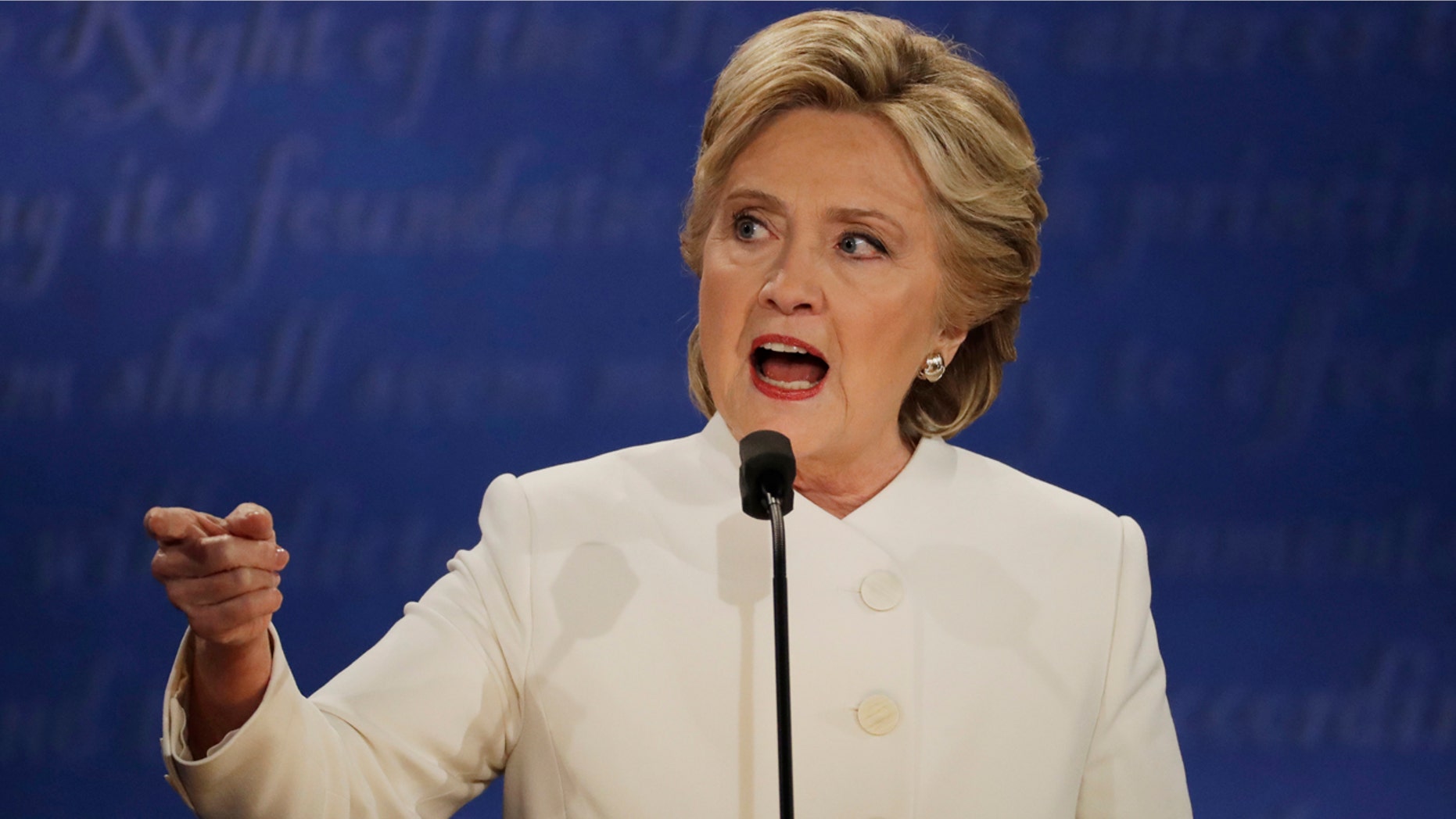 Democratic presidential nominee Hillary Clinton speaks to Republican presidential nominee Donald Trump during the third presidential debate at UNLV in Las Vegas, Wednesday, Oct. 19, 2016. (AP Photo/Patrick Semansky)