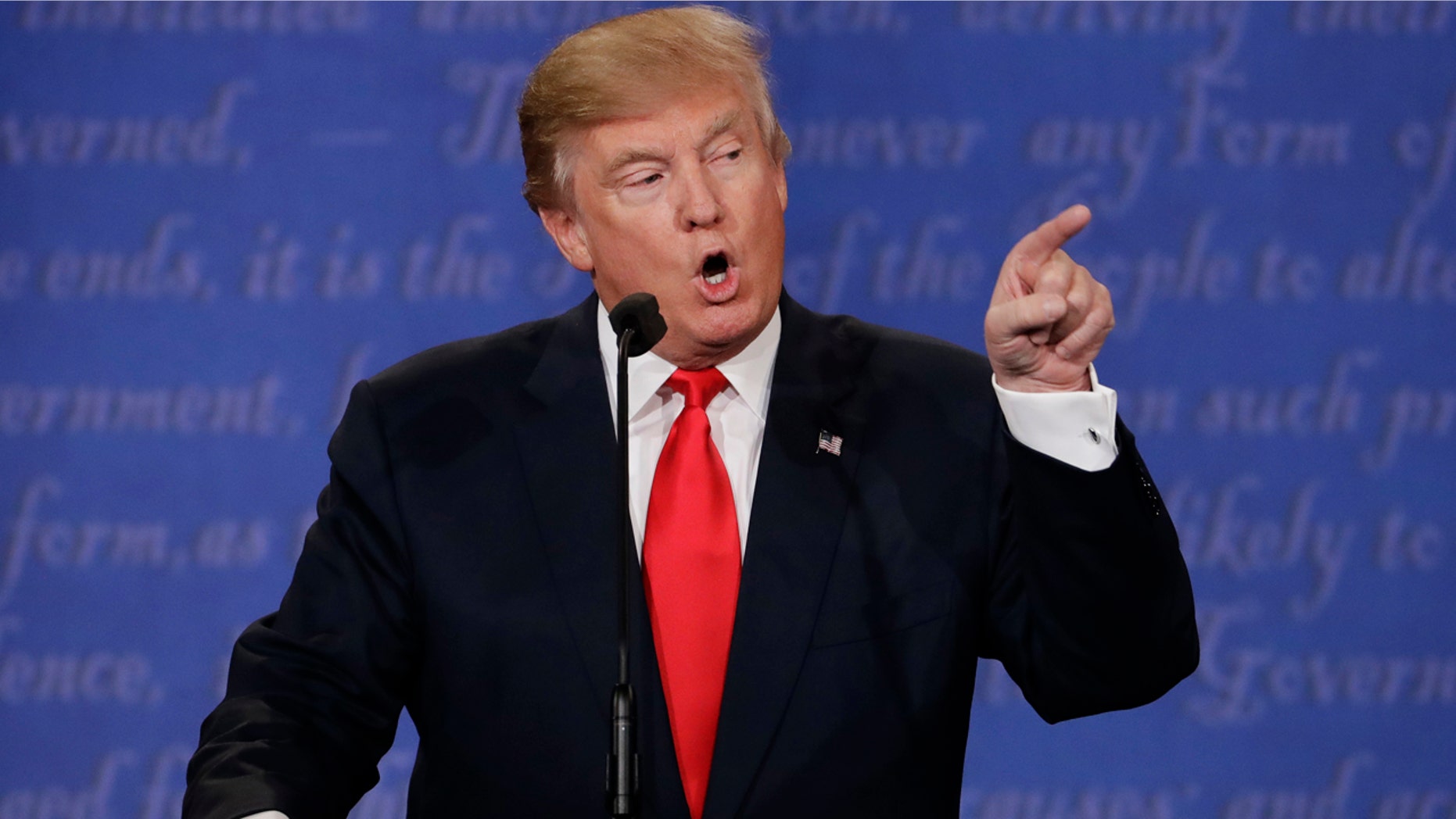 Republican presidential nominee Donald Trump speaks to Democratic presidential nominee Hillary Clinton during the third presidential debate at UNLV in Las Vegas, Wednesday, Oct. 19, 2016. (AP Photo/David Goldman)
