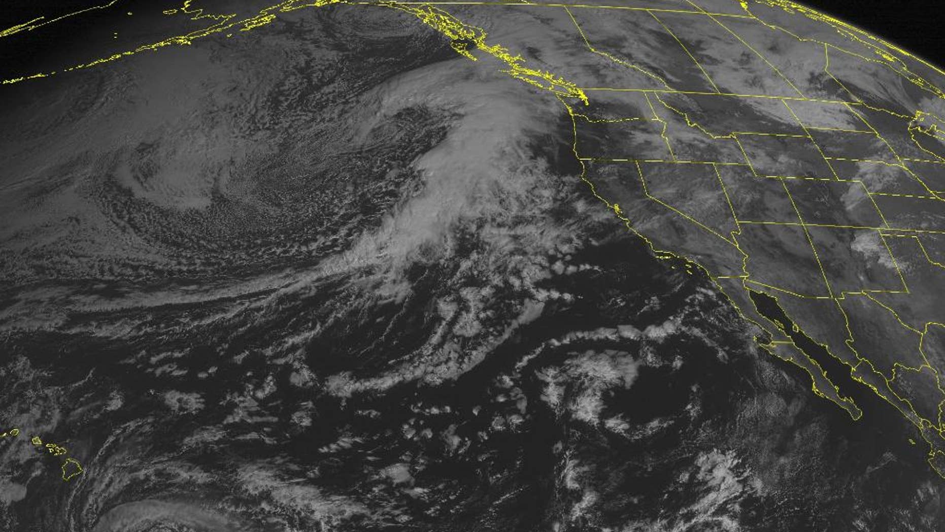 This NOAA satellite image taken Thursday, Oct. 16, 2014 at 2:00 p.m. EDT, shows Tropical Storm Ana 490 miles southeast of Hilo, Hawaii with maximum winds of 60 miles per hour moving westward. Ana should pass just to the south of the Hawaiian island chain and may clip the island of Kauai. On the mainland, an area of low pressure moves into the Pacific Northwest with heavy rain. High pressure dominates over the southwestern Untied States with mostly sunny skies. (AP Photo/ Weather Underground