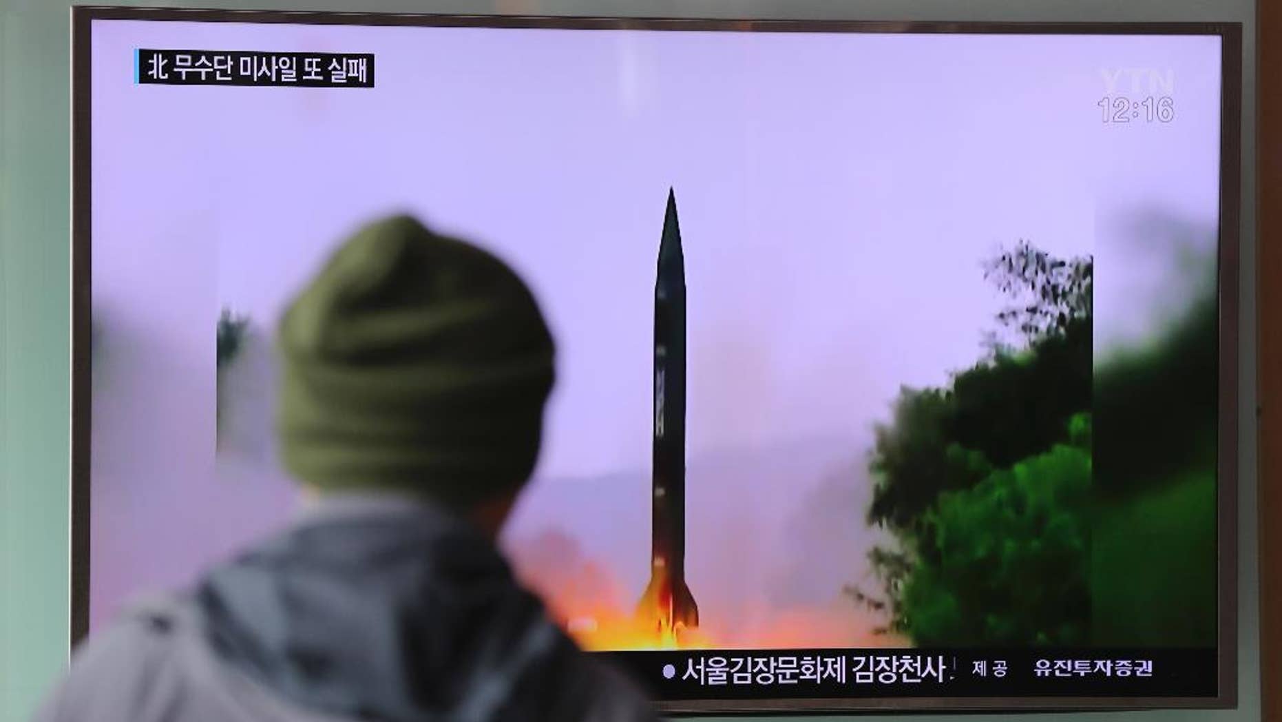 A man watches a TV news program showing a file image of missile launch conducted by North Korea, at the Seoul Railway Station in Seoul, South Korea, Thursday, Oct. 20, 2016. The U.S. military says it detected a "failed" North Korean missile launch on Wednesday. The U.S. Strategic Command issued a statement late Wednesday saying it presumed the missile was a Musudan intermediate-range ballistic missile.(AP Photo/Lee Jin-man)